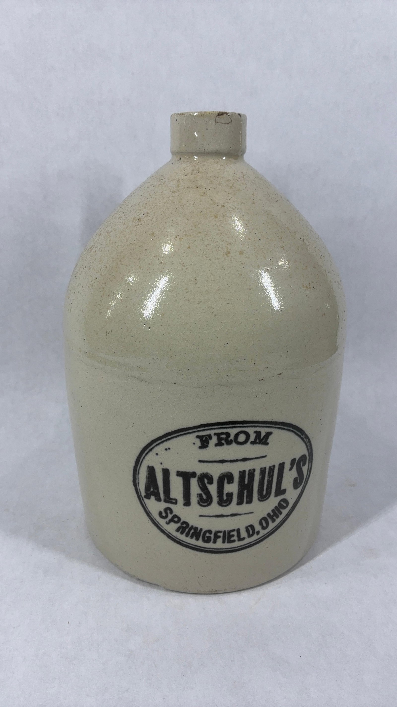 Altschuls Springfield Ohio 1 gal. Stoneware Crock Jug: Great overall condition with flaking showing to rim of opening as seen in photos
