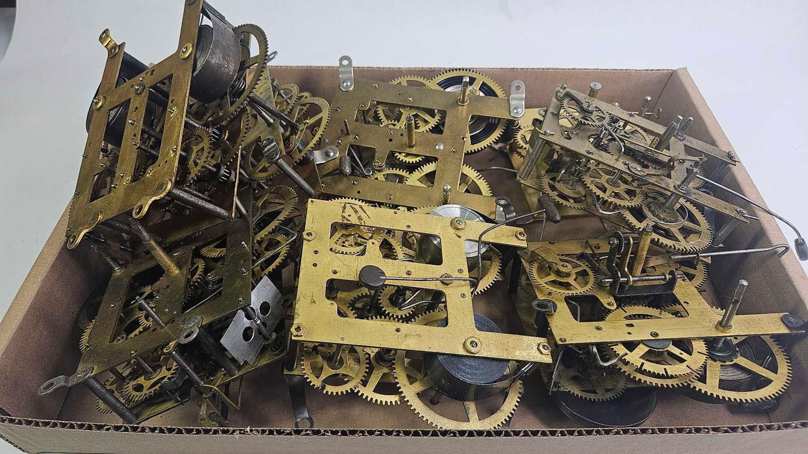 Large Lot of Clock Movements: Several different styles. All are brass.
