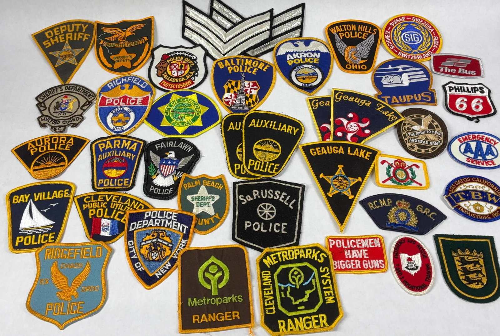 Misc Ohio Police Patches: Geauga Lake, Cleveland Parks, Richfield, Auxiliary, Deputy Sheriff, So. Russell Police and many more.