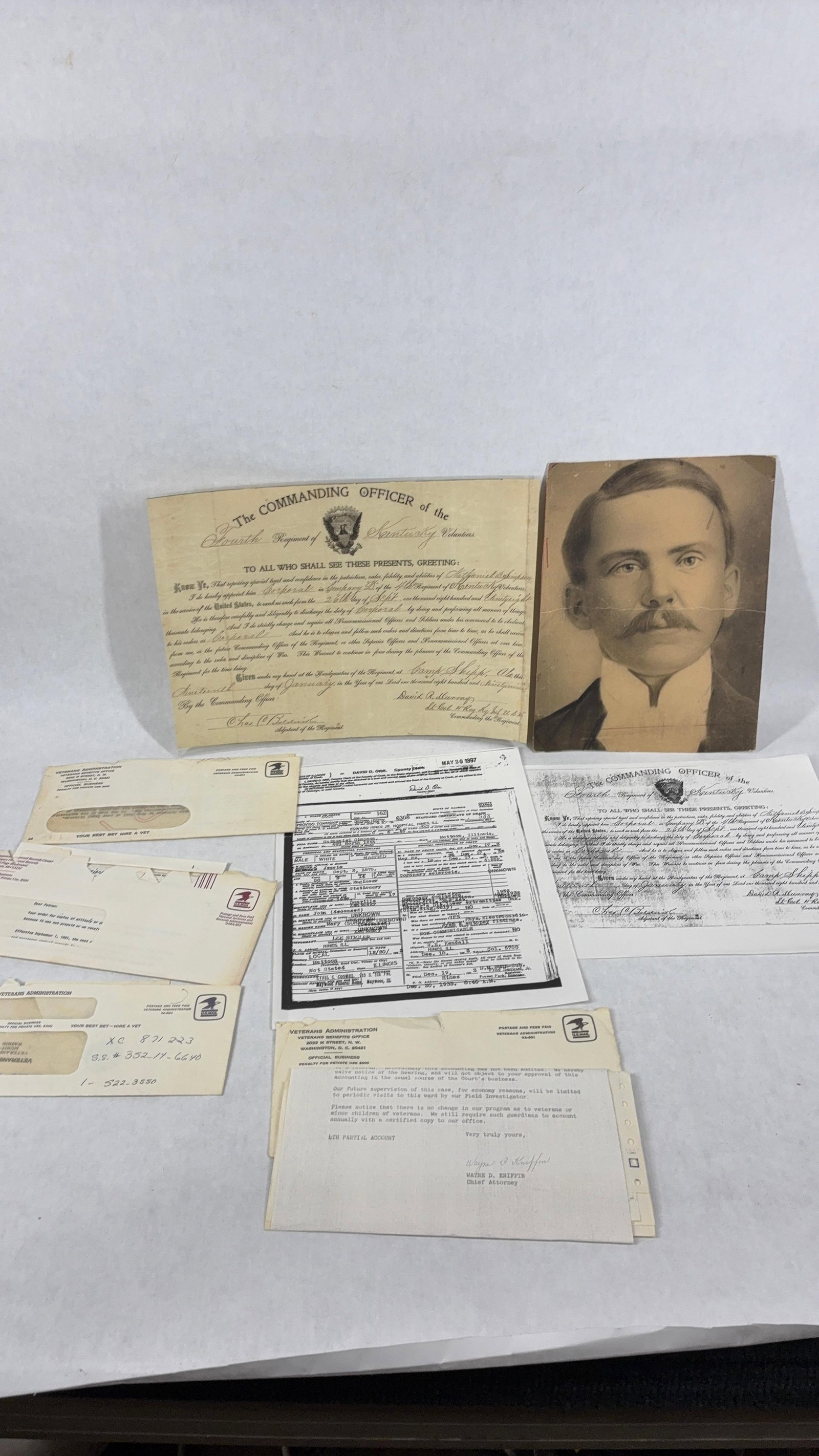 Nathaniel B. Simpson Spanish American Company D Douments from Enlist to Death: This war grouping beginning from 1898 to 1933. Mr. Simpson lived in Kentucky and then Illinois. Included is a photograph at age 25.