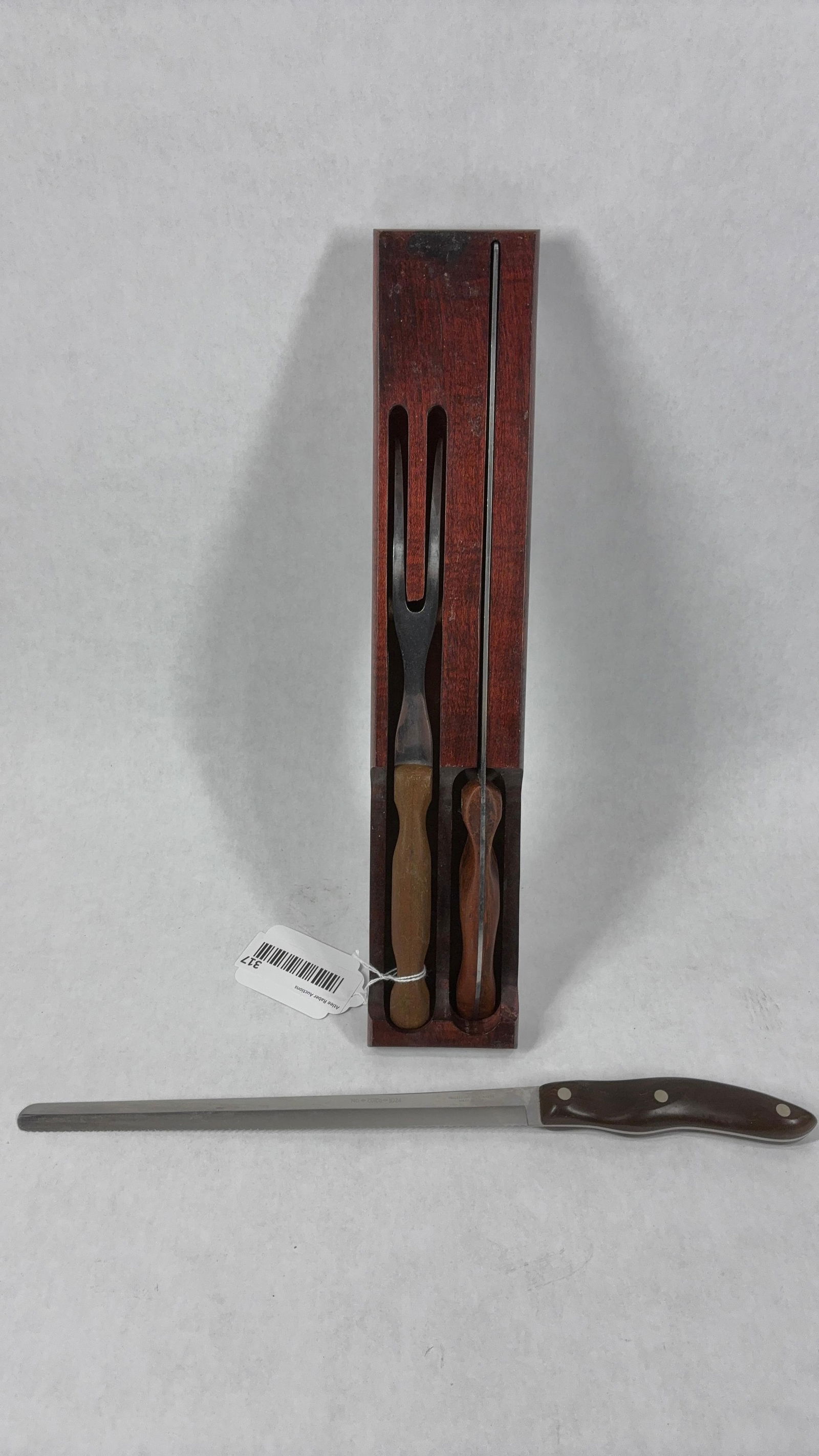 Cutco Knives & Fork: Three great pieces with wooden handles and storage tray. All appear to be in good condition Serrated no 1024, Fork no 27, and no 24 knife.