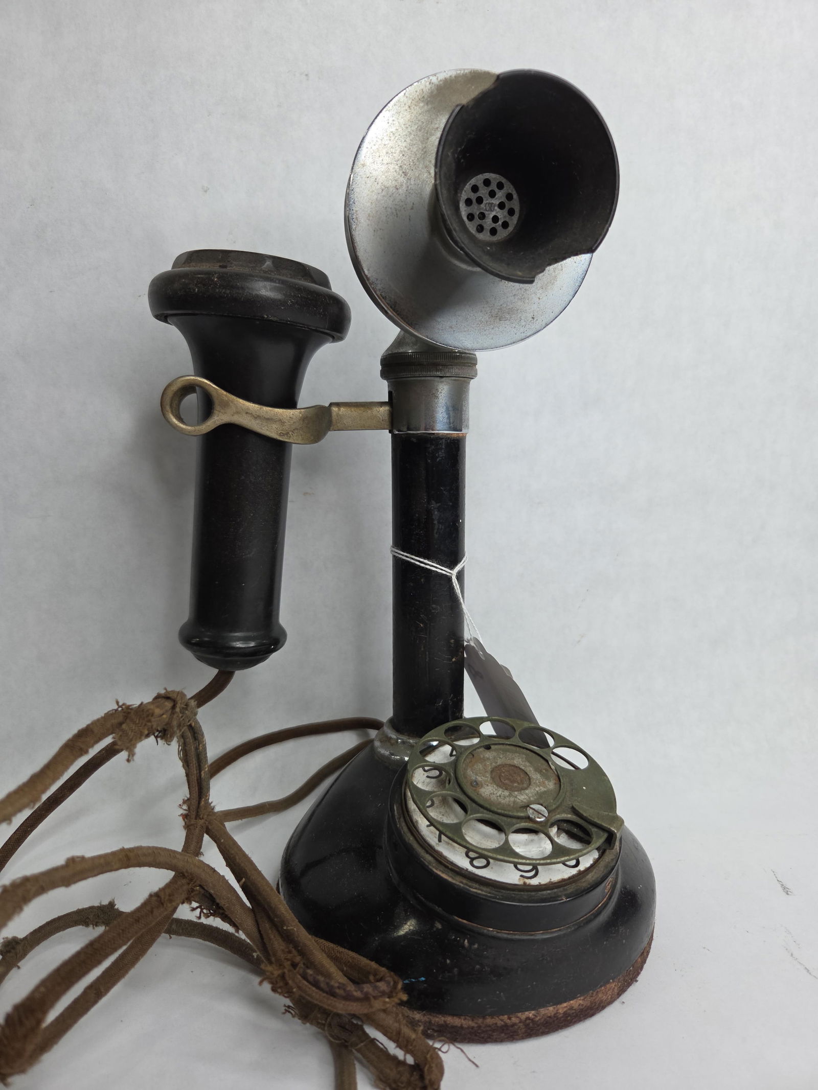 Stromberg-Carlson Tel. MFG. Co. Tabletop Candlestick Rotary Telephone: Enamel dial face with rotary sticking on return as may need oiled showing fraying to cord due to age and usage