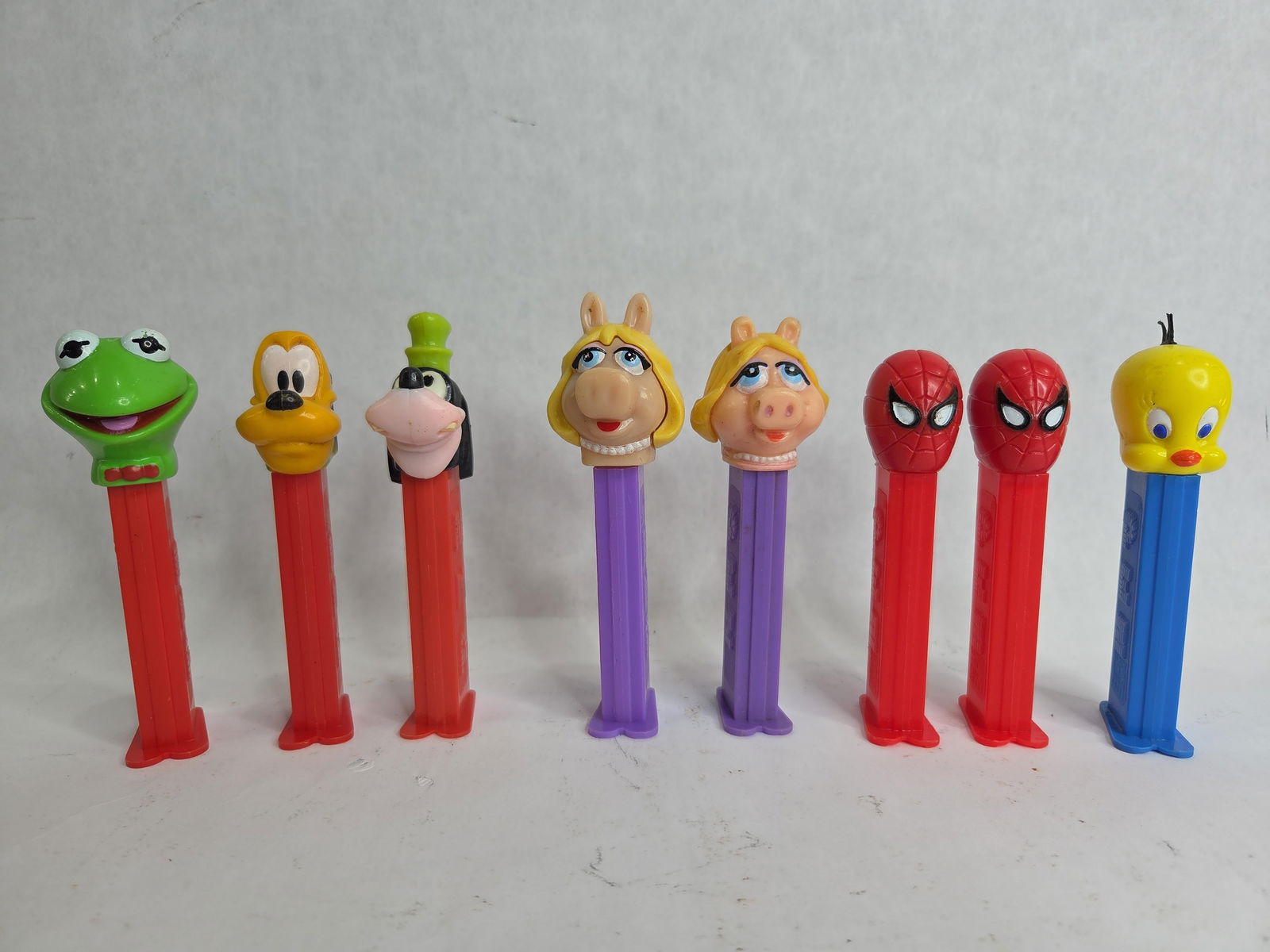 Pez Dispenser Lot Inc. Spiderman, Goofy, Pluto, Miss Piggy, Kermit and Tweety Bird (1 of 6)
