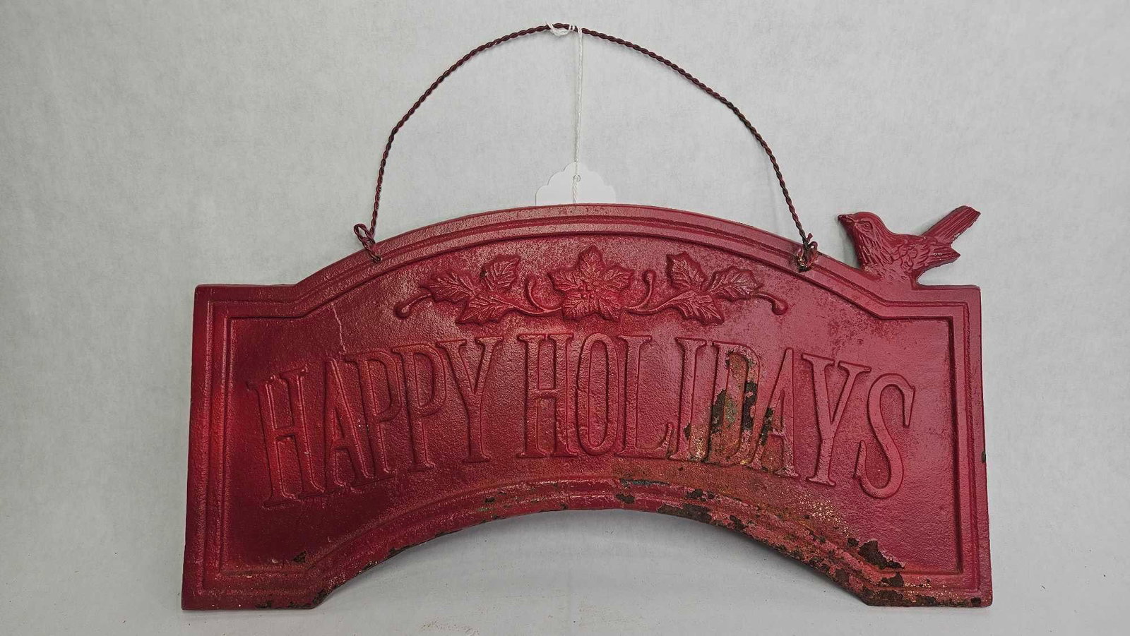 Cast Iron Happy Holiday Plaque: Some paint peeling from one side. 16x8.5