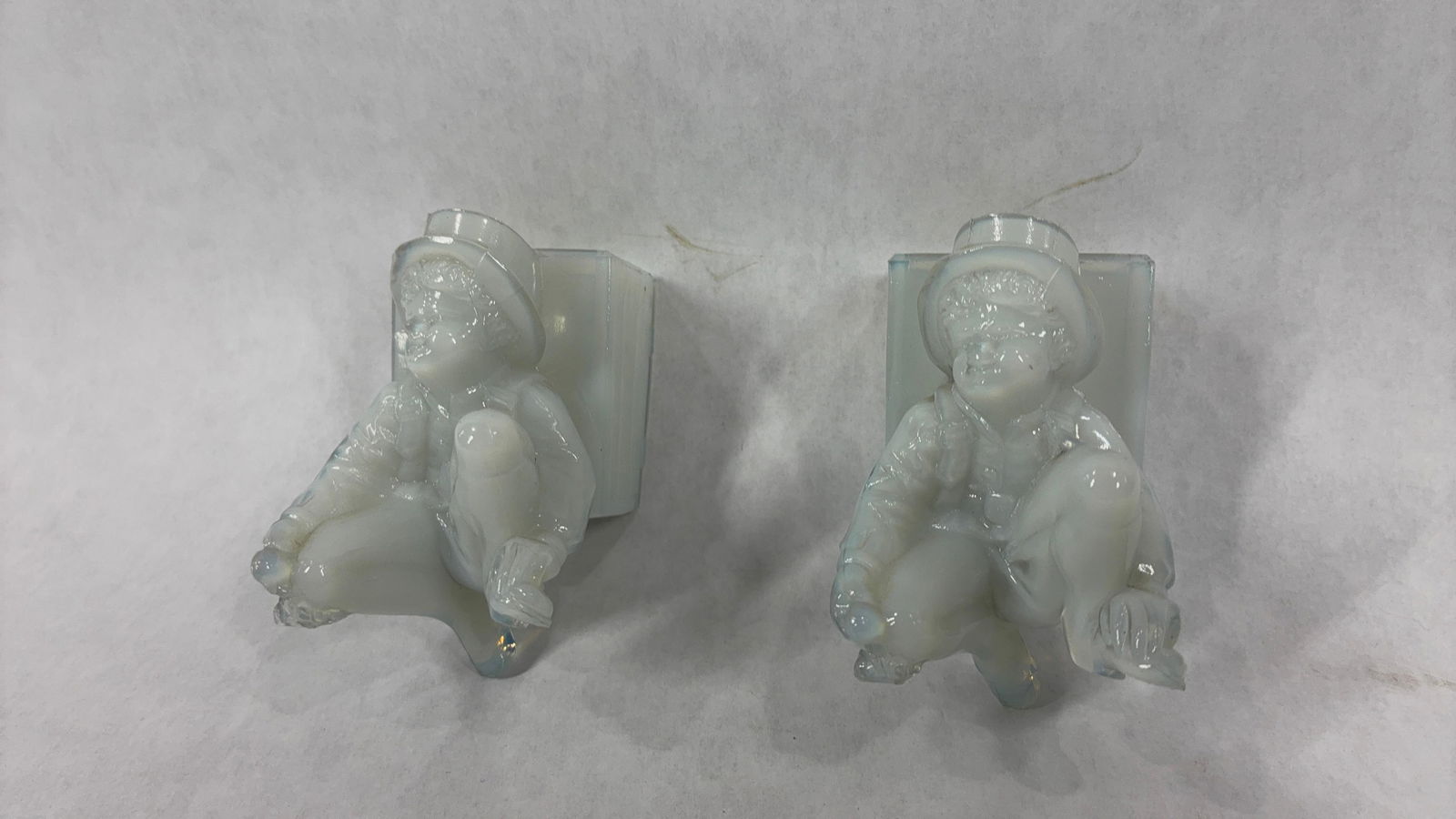 Boyd Freddie the Hobo Clown Match Holders: Lot of two, opal colored art glass. Both are in good condition. approx 3 inches tall.