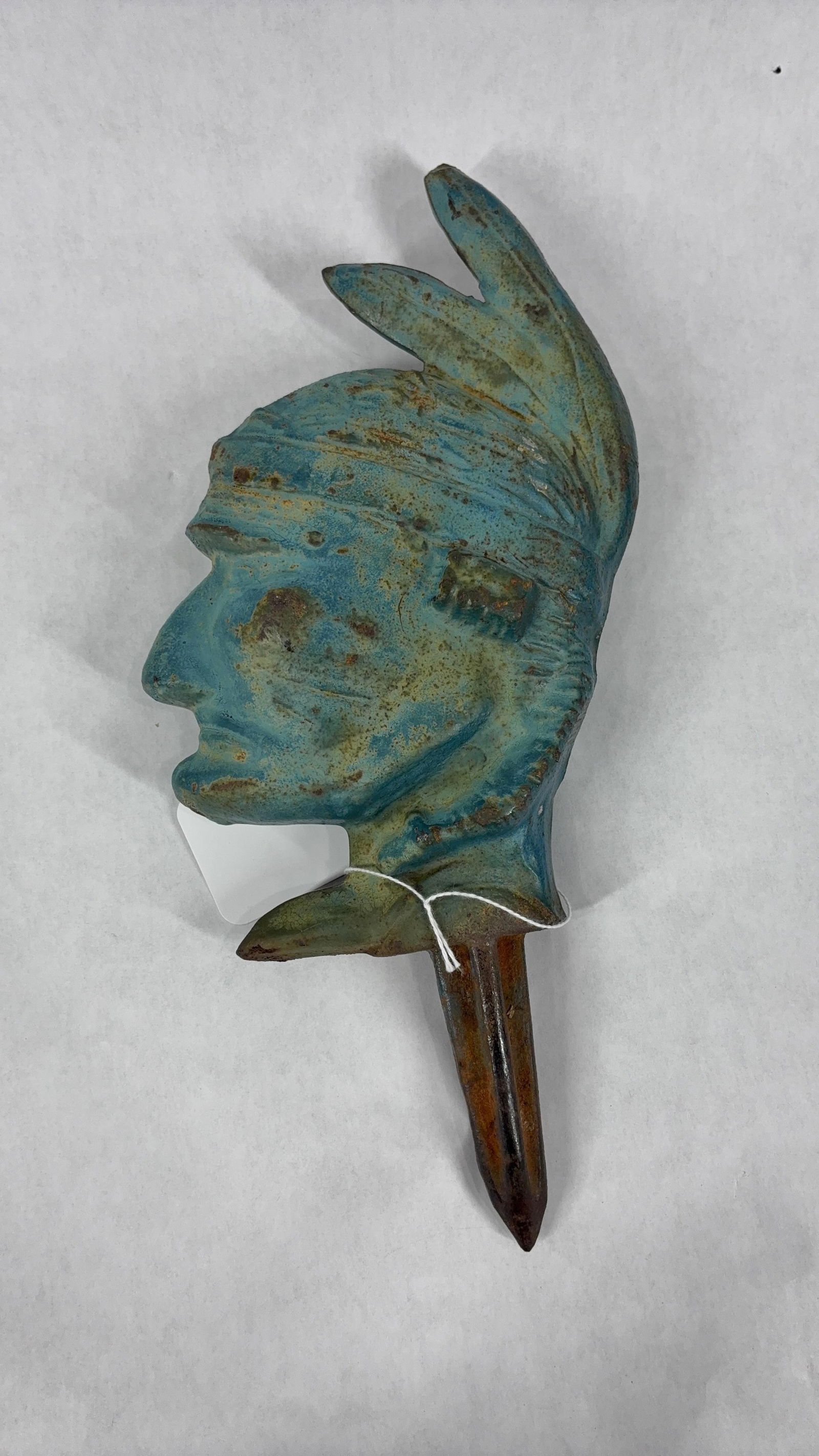 1930s-40s Native American Cast Iron Tee Box Marker: Made for a Green Lake, Wisconsin golf course about 60 years ago, an Indian head cast iron tee-off marker is three dimensional. With shown blue paint, 12x5