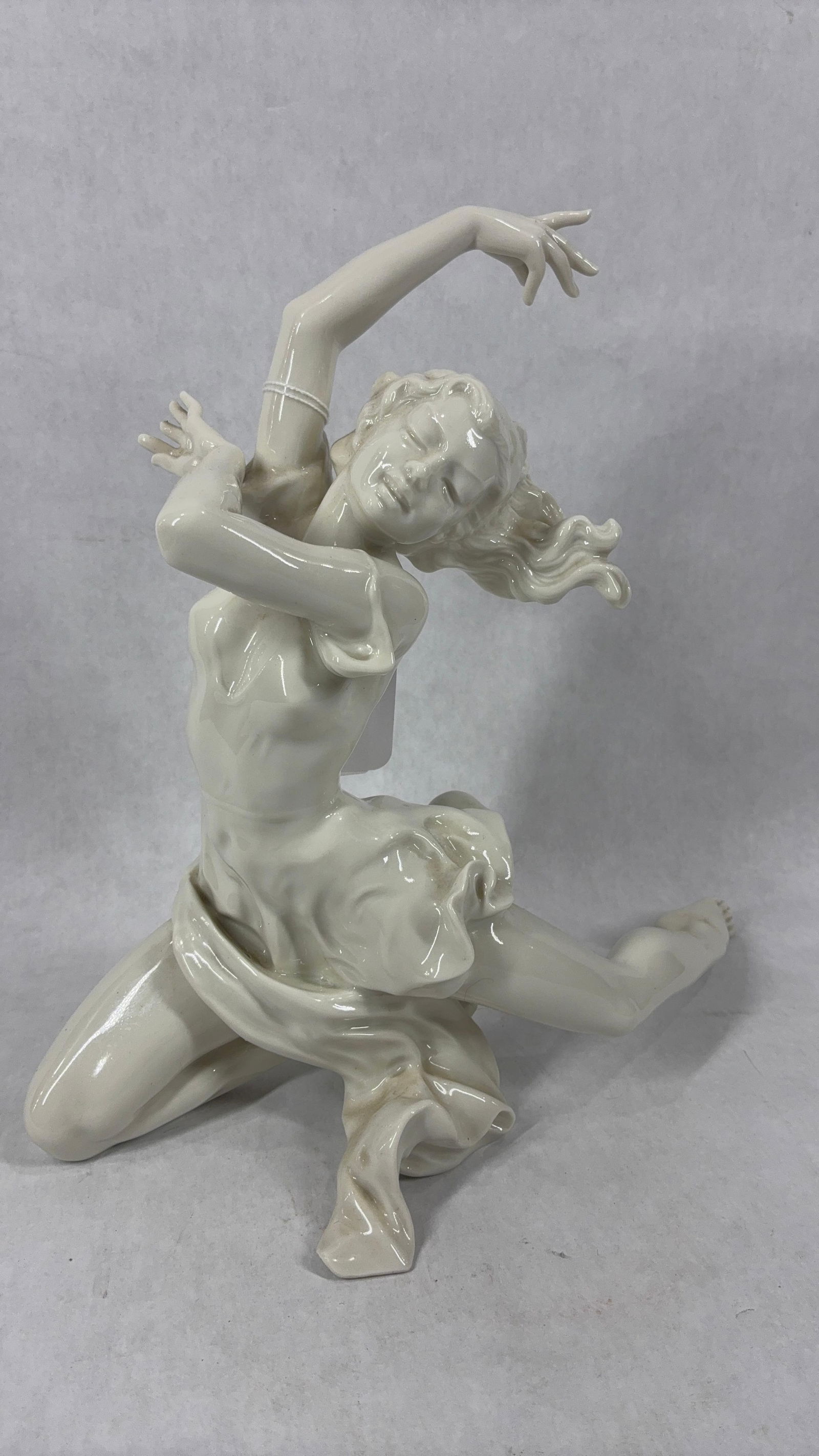 The Finale Porcelain Dancer by Hutschenreuther Karl Tutter: Designed by artist Karl Tutter in the art deco style. Made in Selb Germany. Wonderful condition with makers tags on bottom. 11x12. No chips or cracks.