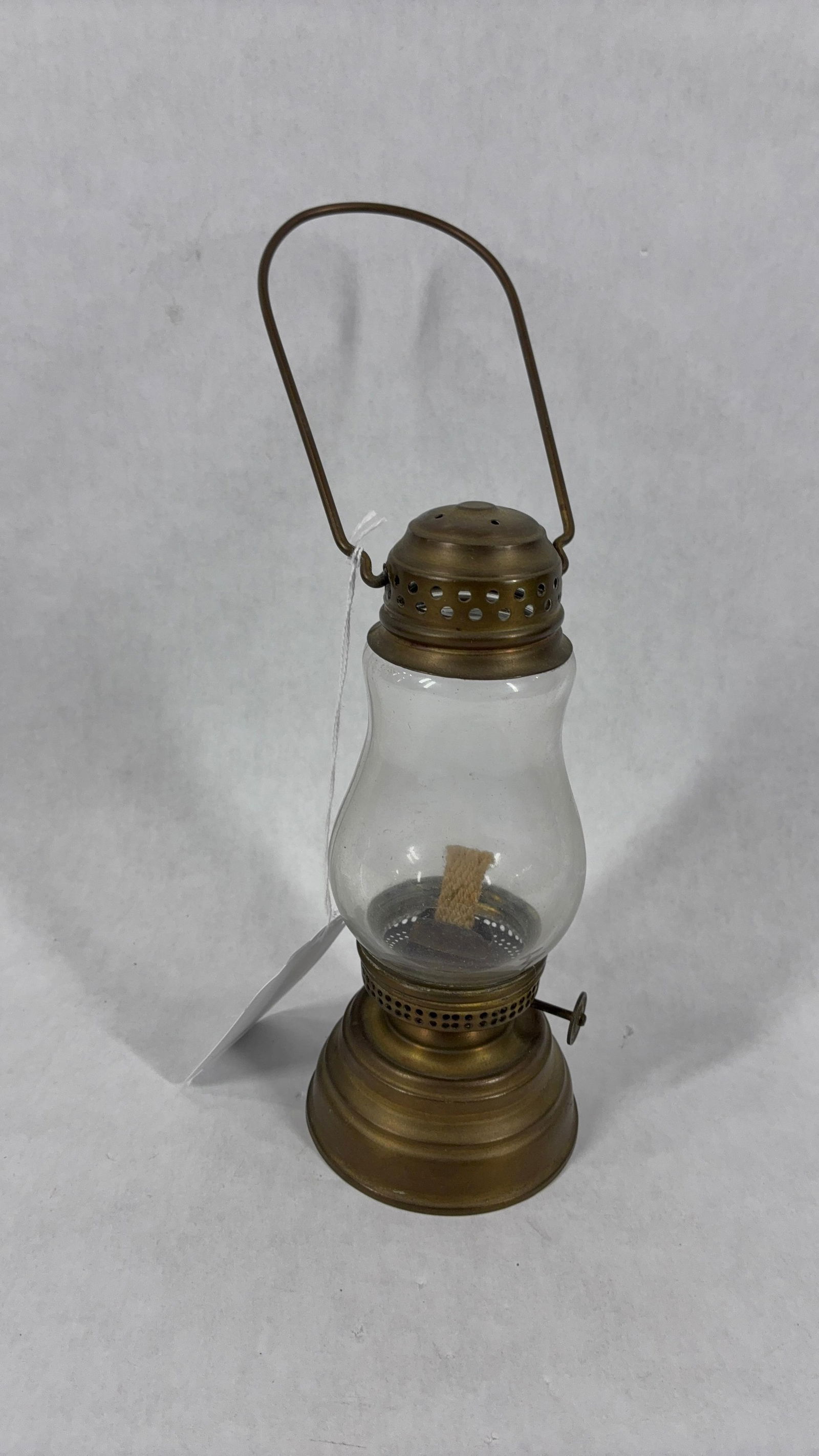 Early Brass Body Skaters Lantern: Glass globe, 7 inches tall. Good condition