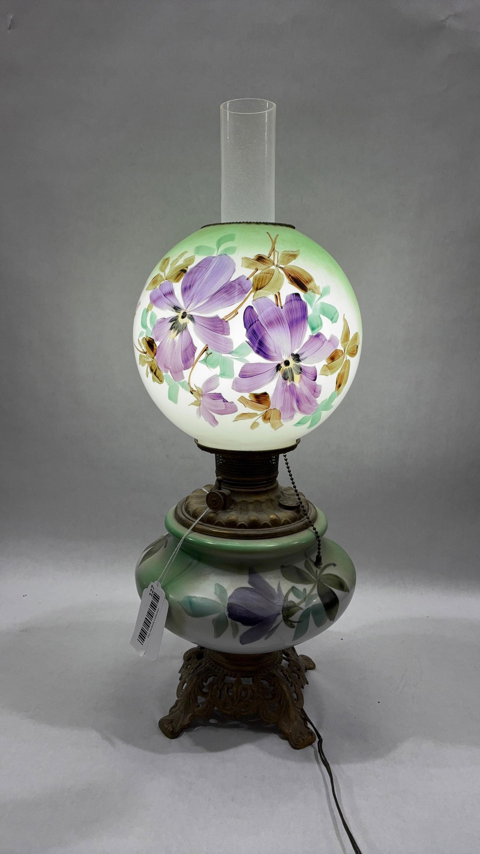 Gone with the Wind Hand Painted Hurricane Lamp: Mint green color with floral painted details. In good condition but cord shows some wires. 24 inches to top of chimney.