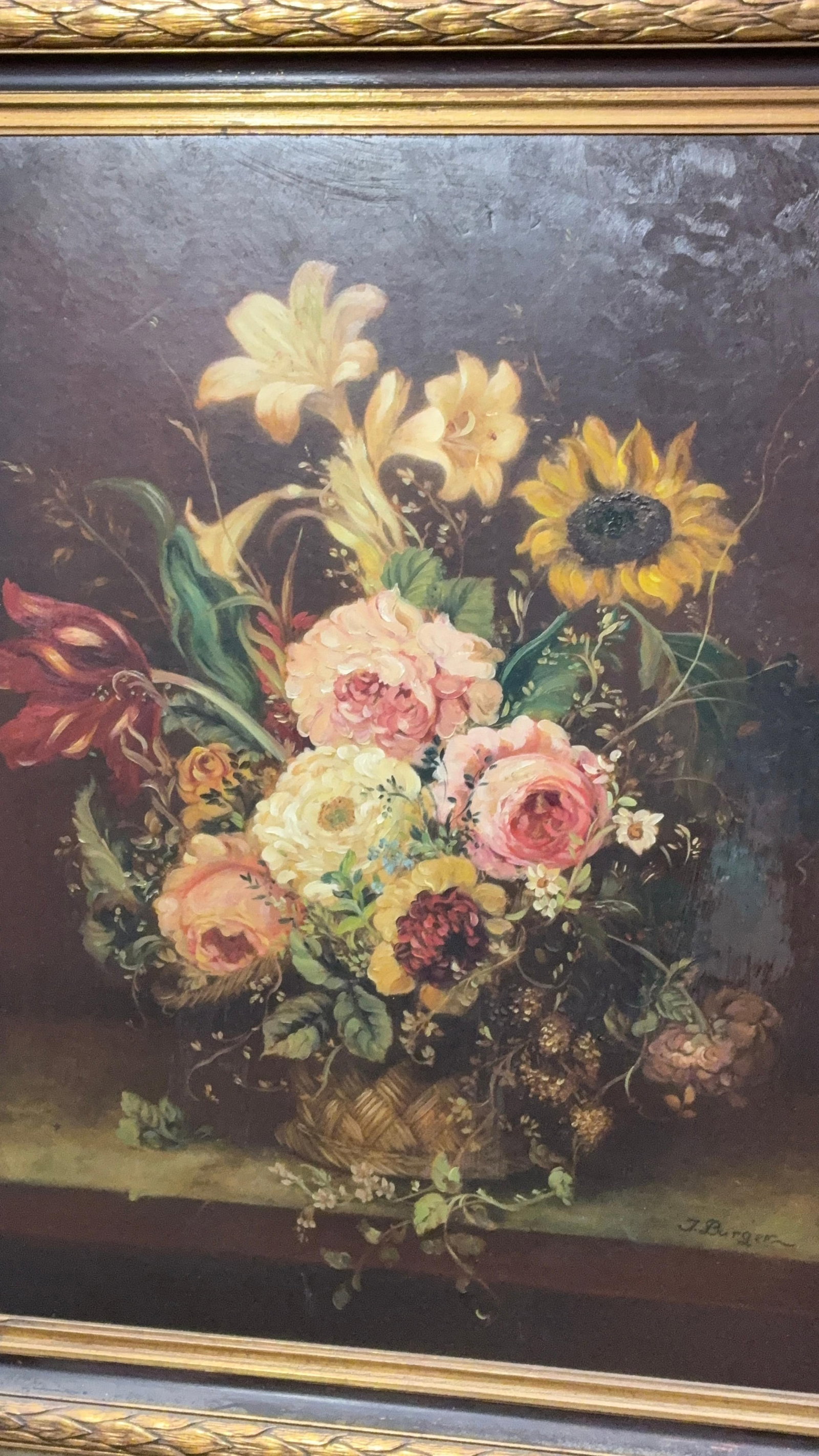 1960s J. Burger Flower Bouquet Oil Painting: An original, back is marked that it was given as a gift in the 1960s. A gold toned frame fits perfect with the dark color scheme of the flowers. Signed by J. Burger. 27.5x32.5