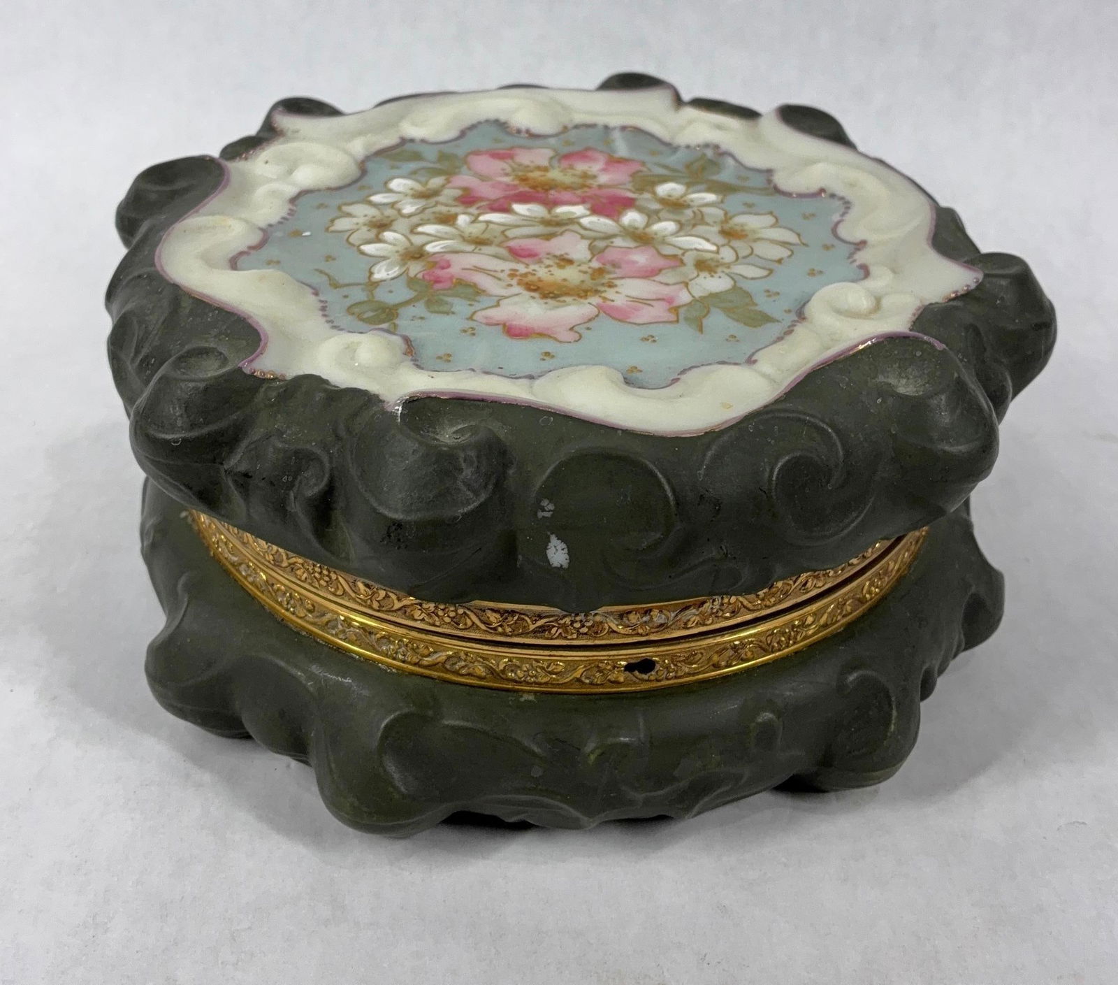 Wave Crest Hand Painted Dresser Box: Dating to late 1800s to early 1900s, a floral design with satin scroll design box and brass closer. 8x3. One flea bite from side, no major damage or cracks.
