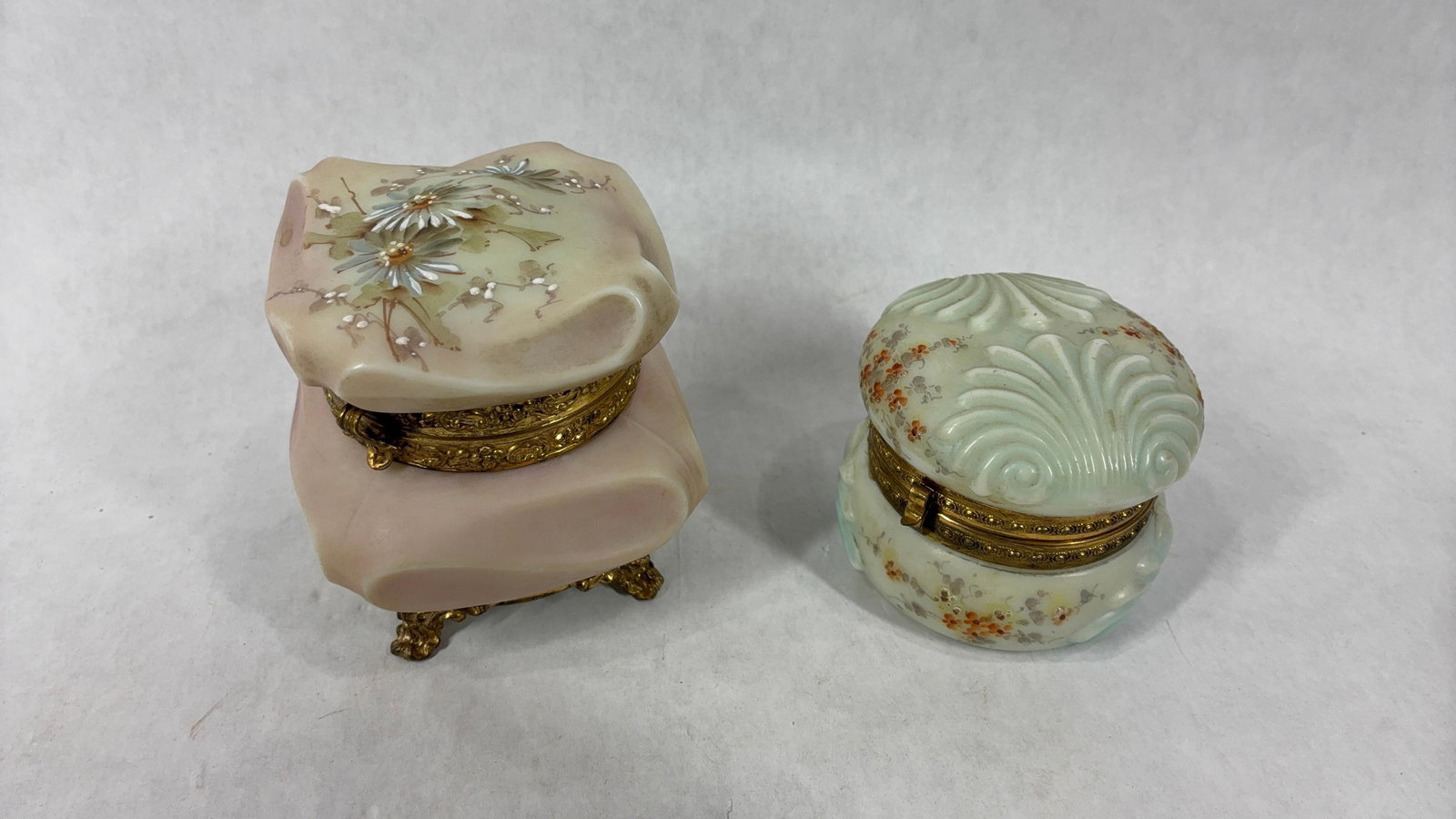 Wonderful Floral Porcelain Wave Crest Dresser Boxes: Floral hand painted designs. One still contains silk liner. 3x2.5 and 3.5x3.5. No chips or cracks.