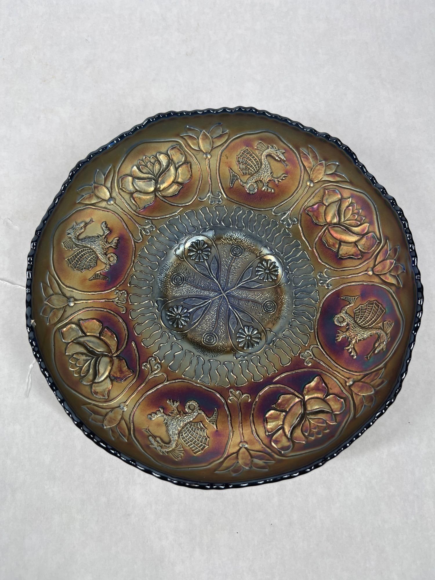 Fenton Dragon & Lotus Carnival Glass Bowl: Ca early 1900s, with a pattern including alternating dragons and lotus flowers with a scalloped edge. 8 inches in diameter. No chips or cracks.