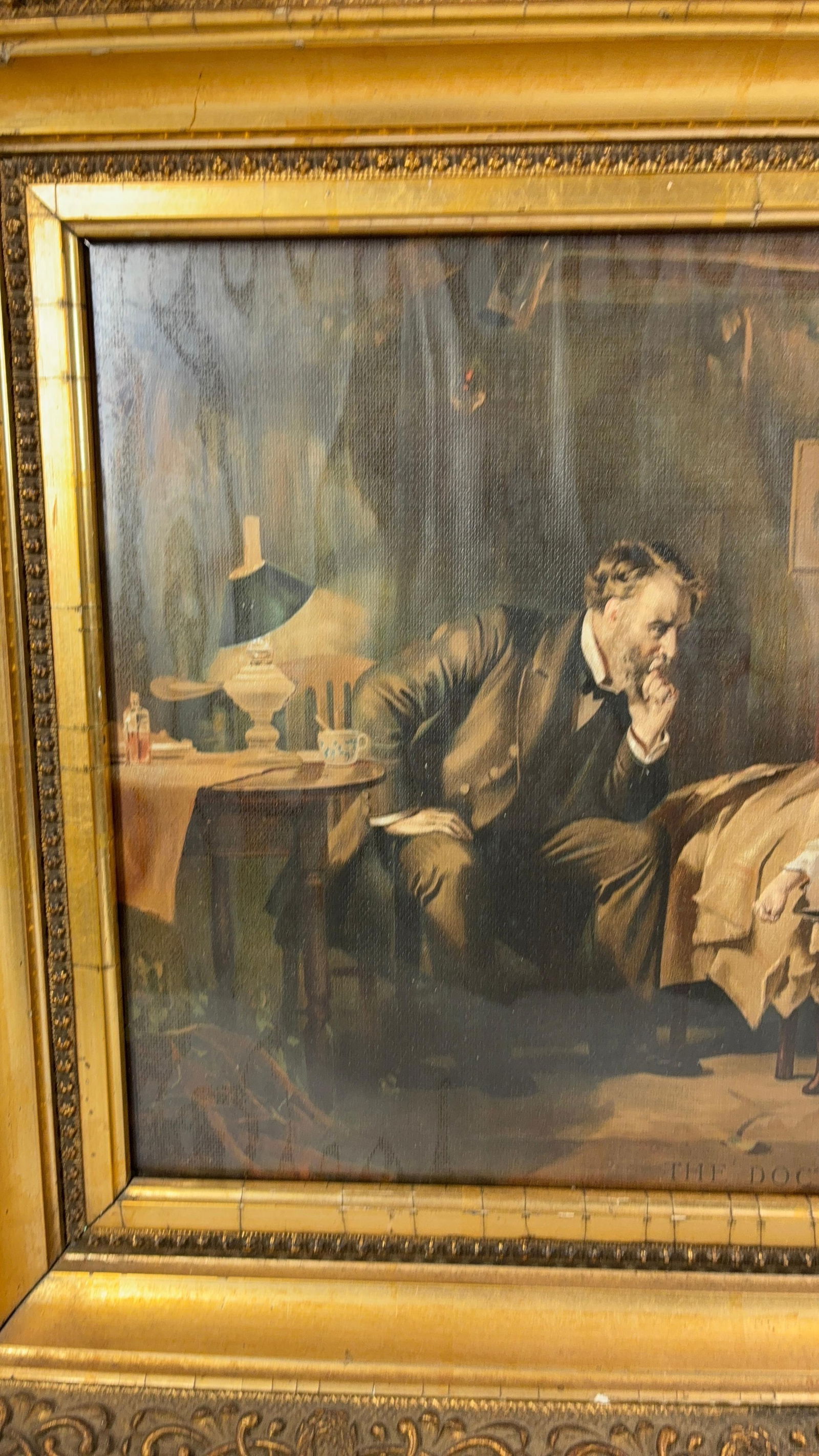The Famous 1891 Painting Titled The Doctor Print on Canvas: Original artist was Sir Samuel Luke Fields. This is a print over canvas framed in a nice gold toned frame. Compliments of the Arlington Chem CoMedicine Manufacturer. 18.5x14