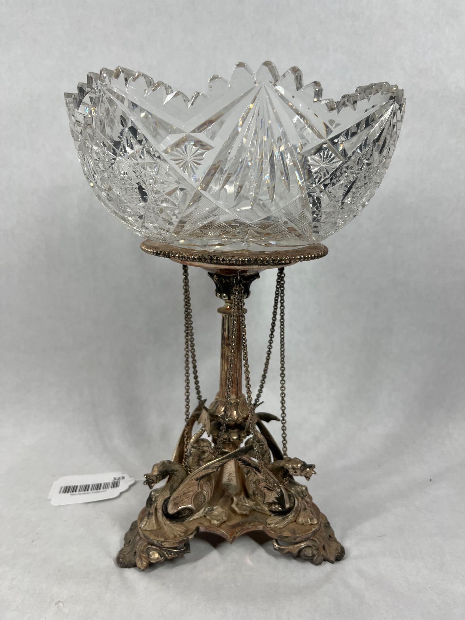 Chinese Empire SIlver plated & Crystal Dragon Centerpiece: One of a kind silver plated stand. Featuring winged dragons with chain accents. A Crystal cut bowl may not be original but fits perfectly. Entire pair is 12 inches tall.