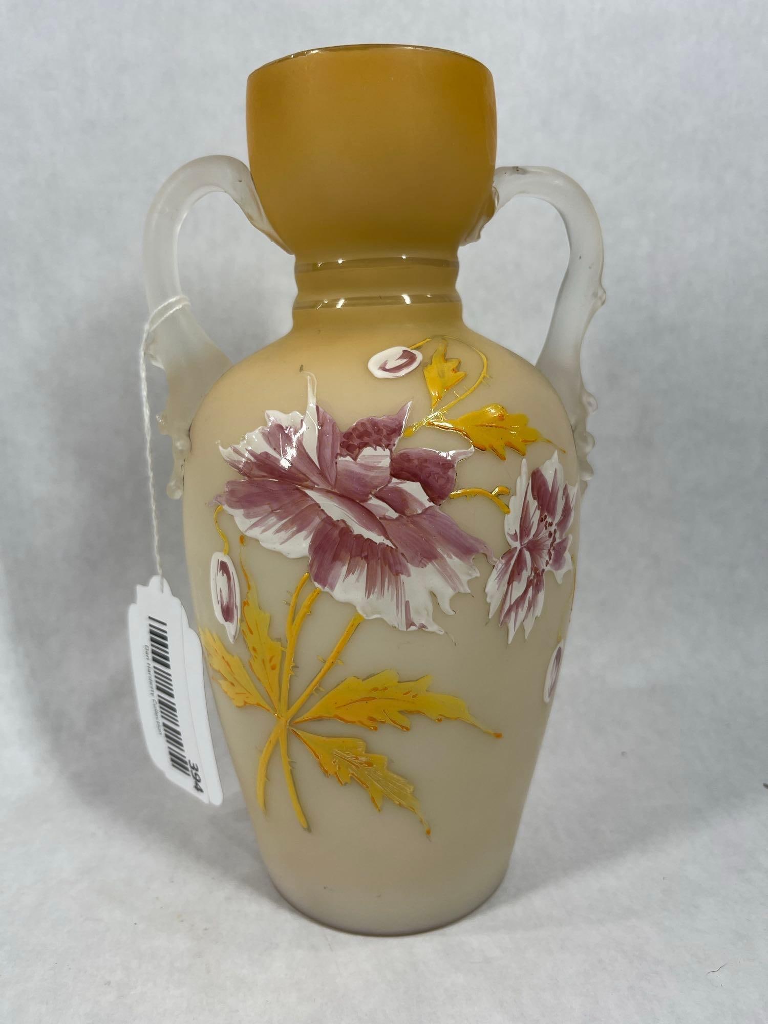 Victorian Hand Painted Peach Satin Glass Ewer: Art glass handles with a double walled glass body. 9 inches tall. Possibly Thomas Webb artist. A few flea bites to rim.