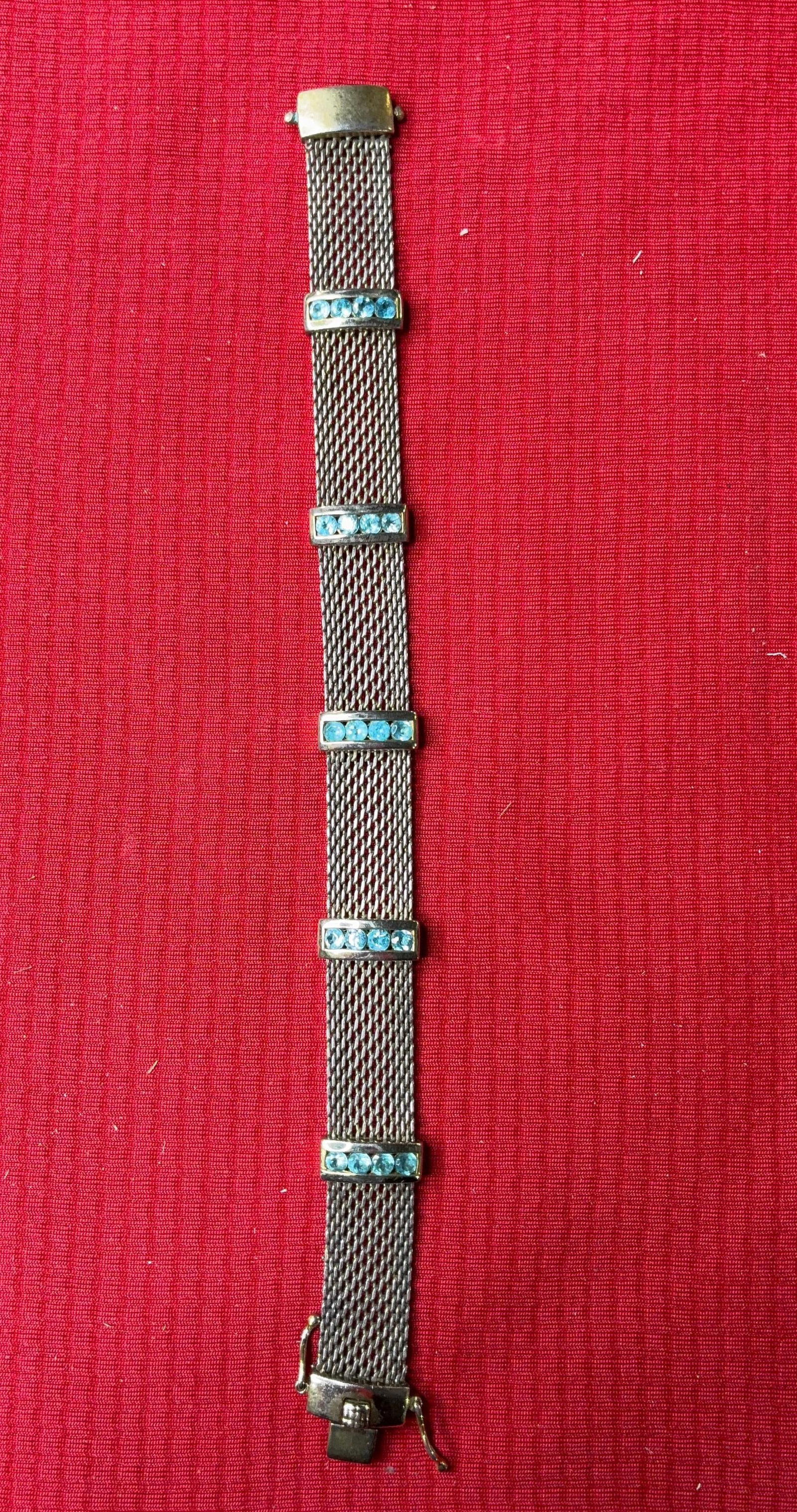 Modern Sterling & Natural Blue Topaz Mesh Bracelet: .925,weighing 22.5 grams. 7 inches long.