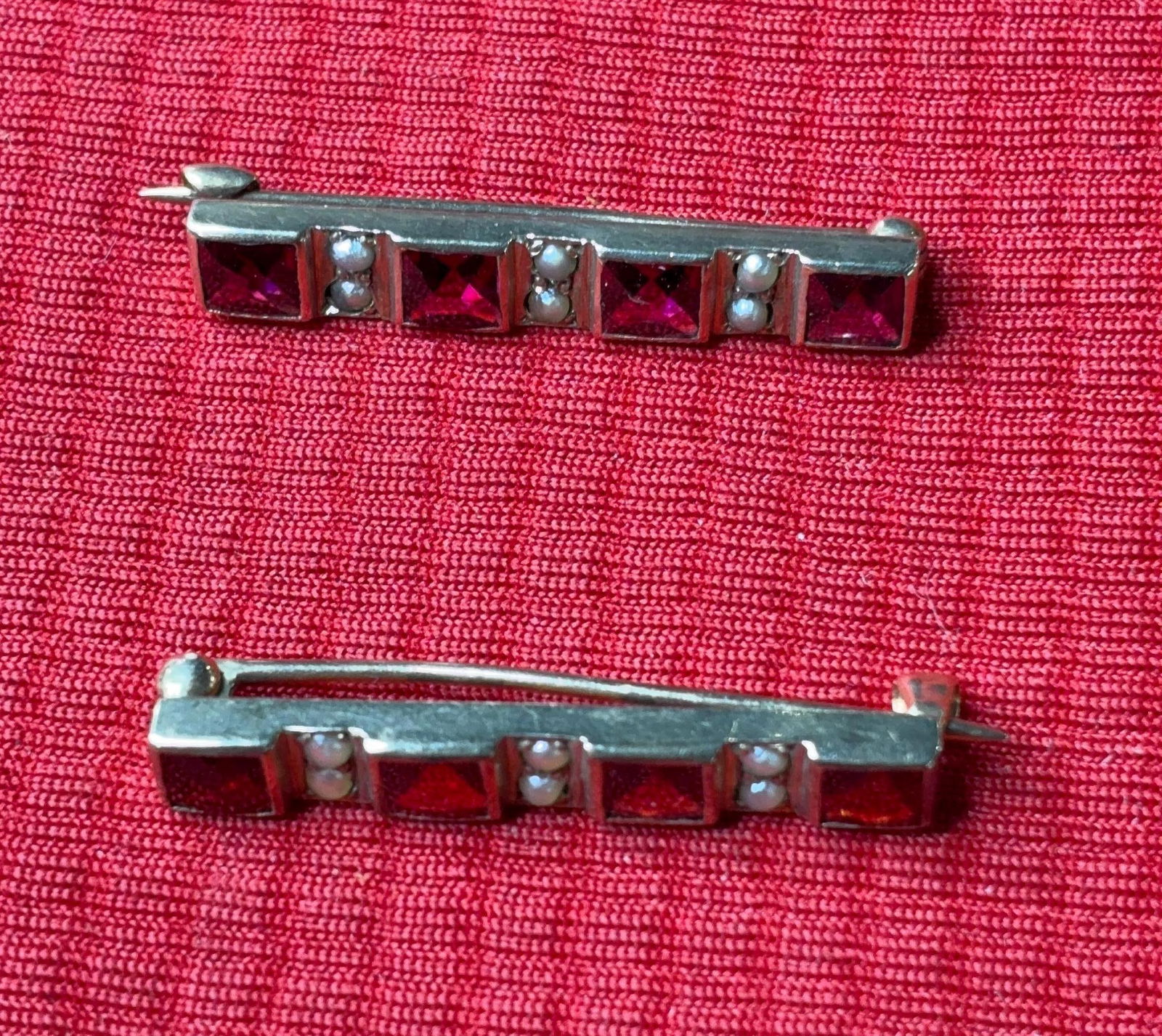 10K Gold Seed Pearl & Garnet Lingerie Pins: 4.4 grams. Each pin includes stones and set seed pearls. 1.5 inches.