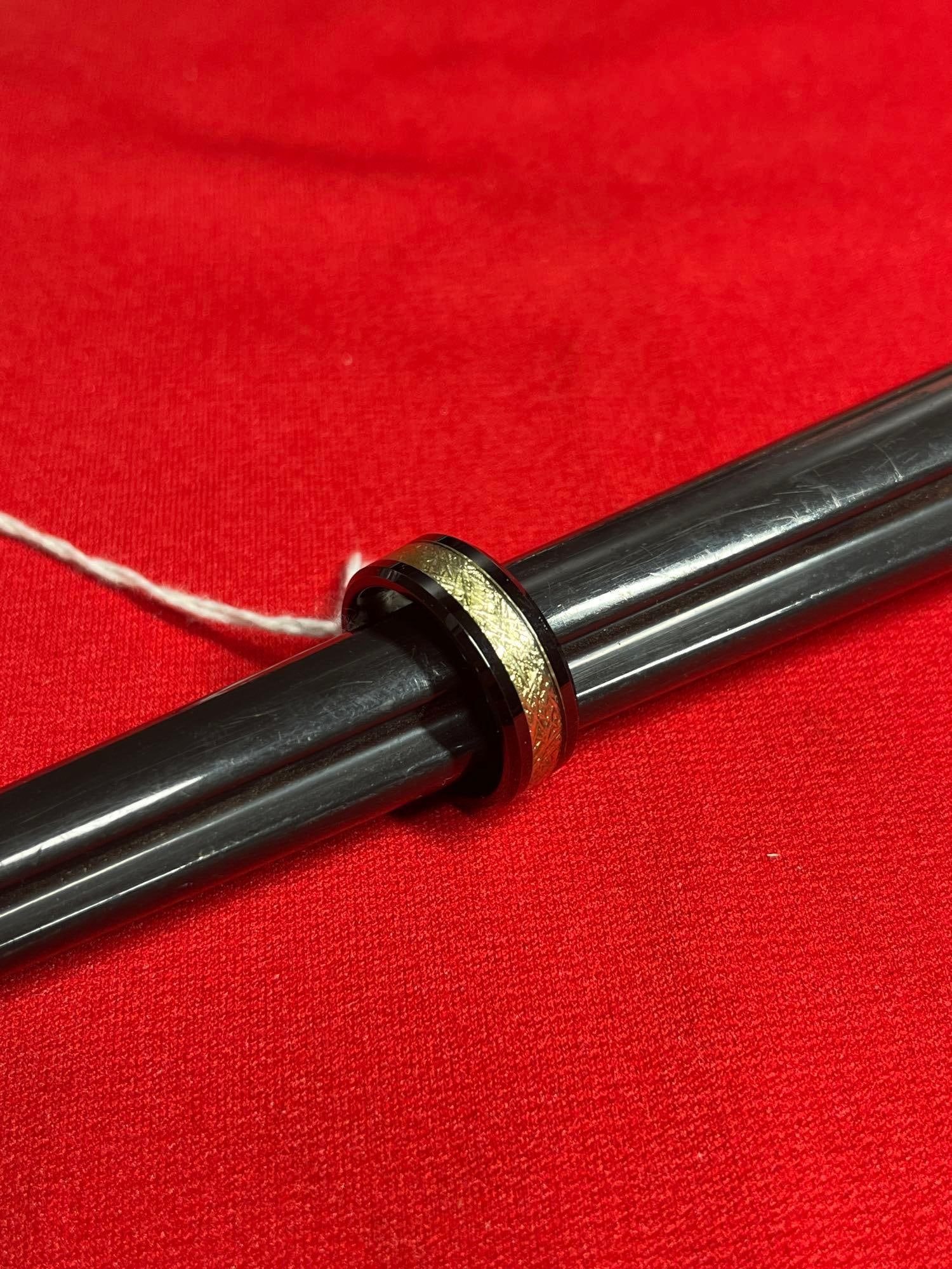 Mens Tungsten Carbide Meteor Wedding Band: This ring has a band of meteor rock, size 10