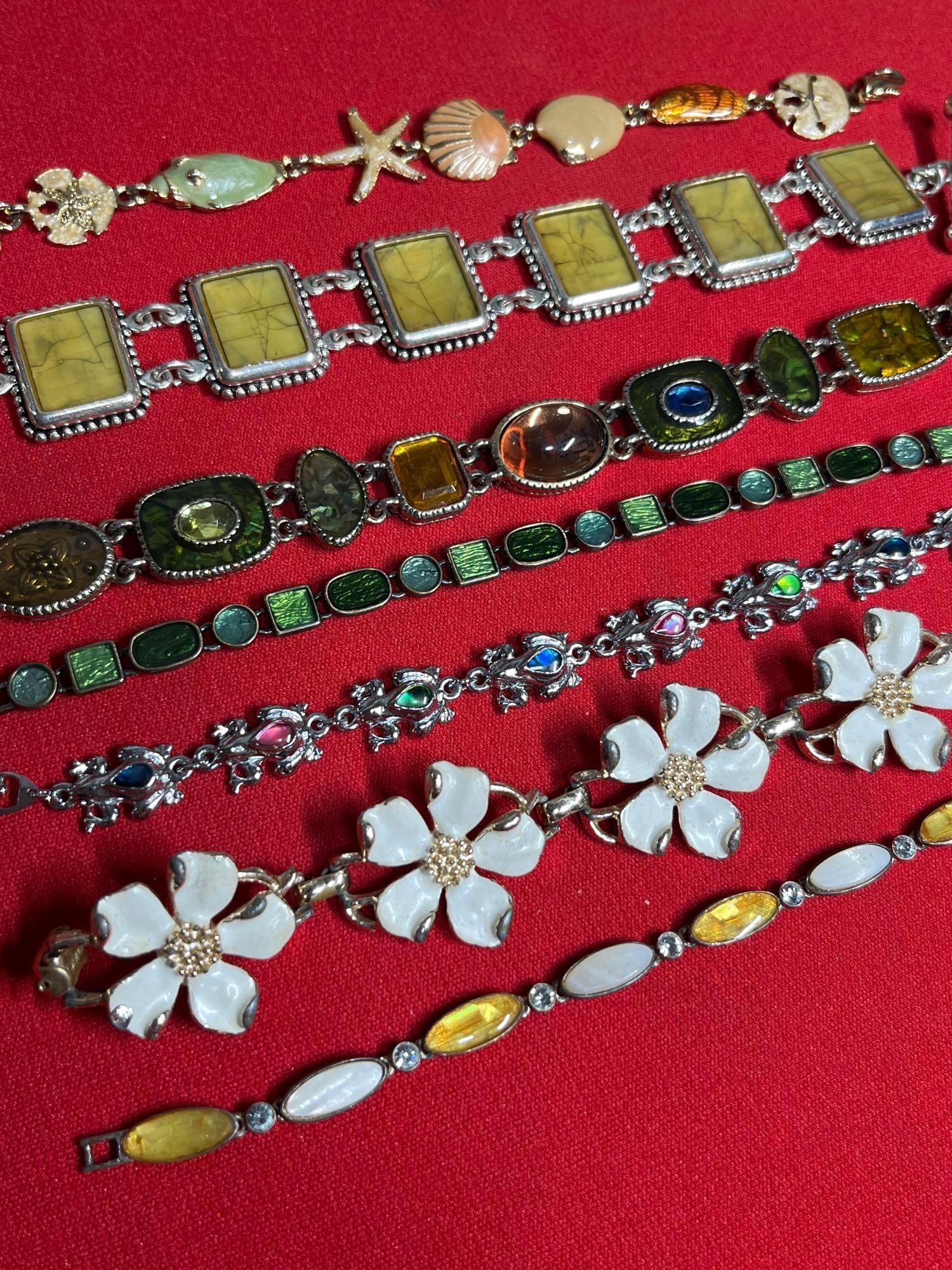 Designer Panel, Charm,and Enamel Bracelets: Emmons, JJI, Le, SJ, Premier designs.
