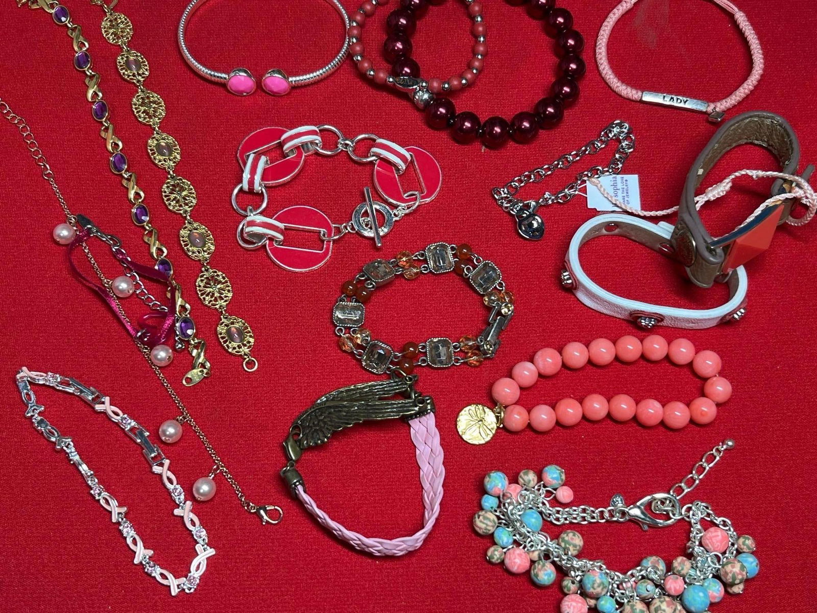 Coral & Red Designer Bracelets: Napier, JIB, Disney, Chaps, Lia Sophia, and more. SOme older vintage pieces are included.