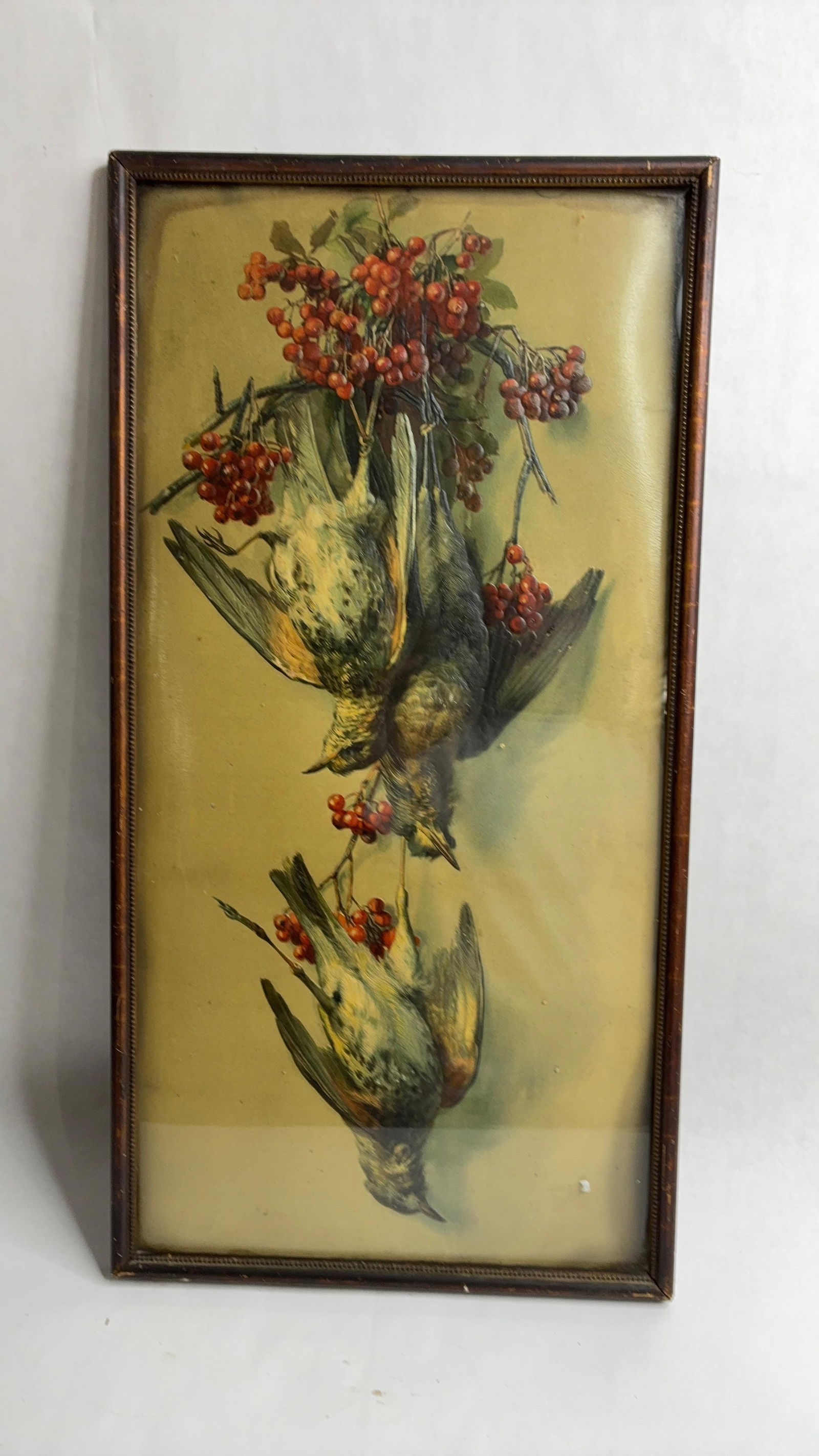 Embossed Bird & Wild Berries Game Lithograph: A good showing piece with three birds and berries hanging. In a simple wood frame. 24x12, some minor discoloration to top and bottom edging