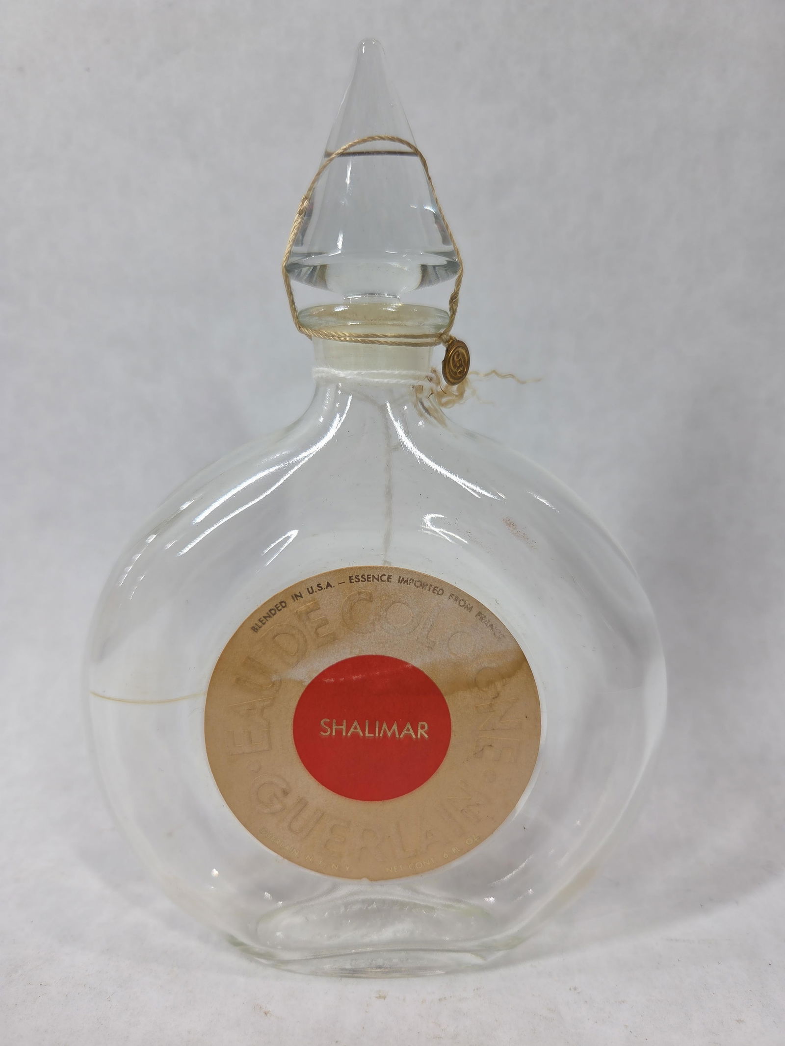 Guerlain Shalimar Eaude Cologne Bottle w/ Stopper: Great bottle with no contents original stopper and original label?6 oz. bottle?
