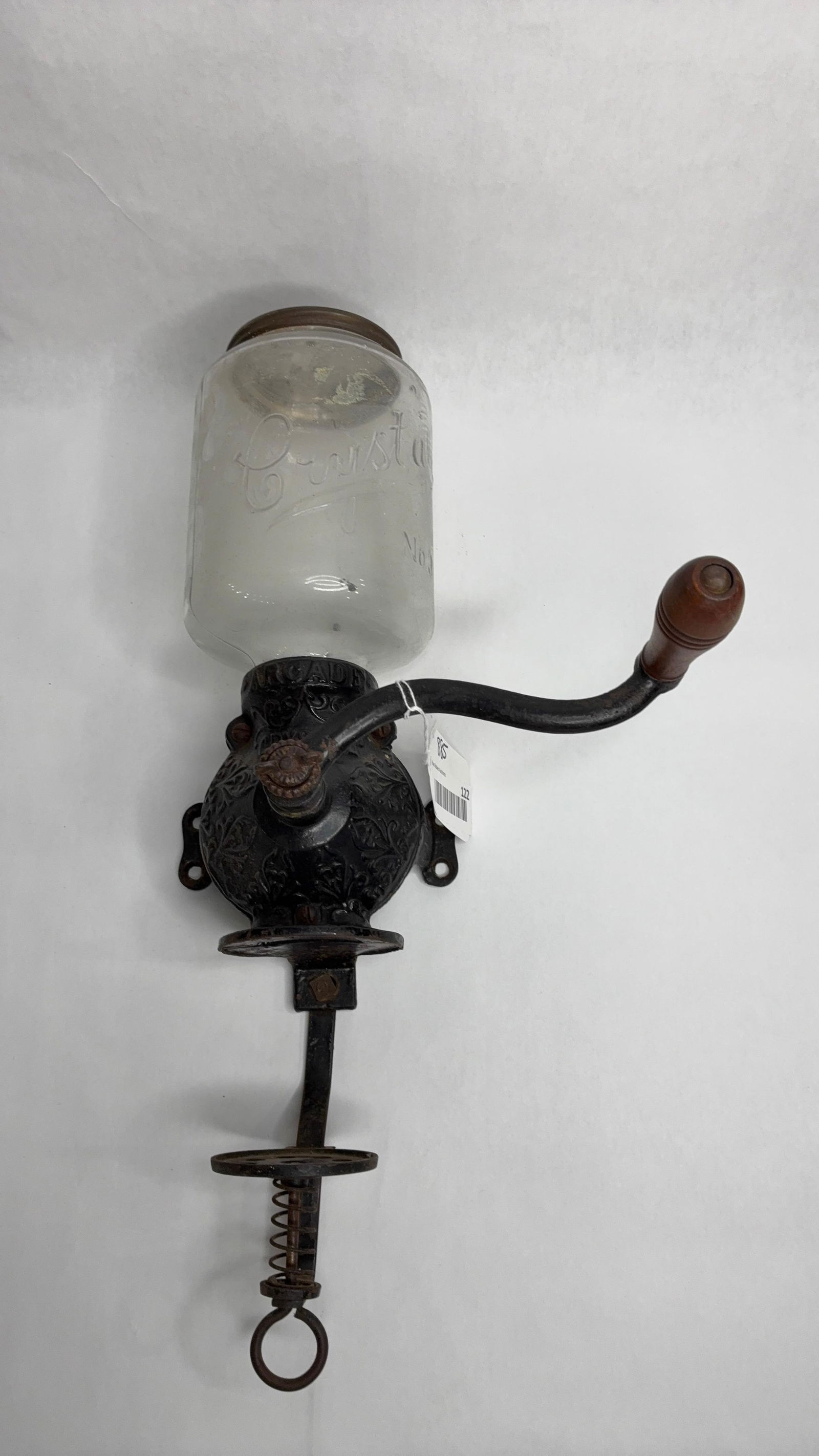 C. 1900 Arcade Crystal No. 3 Wall Mount Coffee Grinder: Great overall condition with all parts moving freely as should and glass jar fully intact with no chips, cracks or breaks and including original cap/ lid and only missing bottom grinding cup