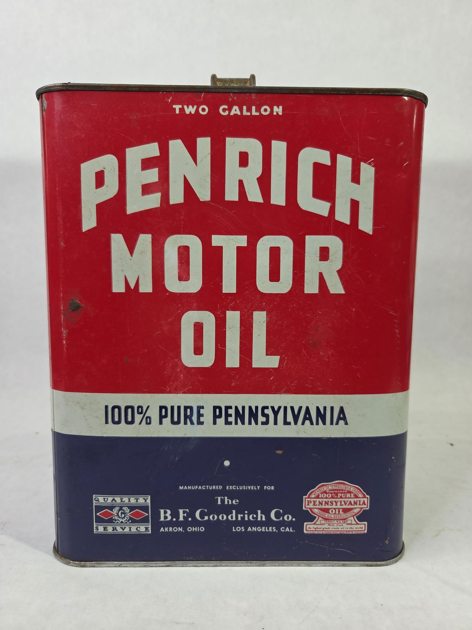 B.F. Goodrich Co. Penrich Motor Oil 2 Gal Can: Missing cap with overall good condition showing with minor denting