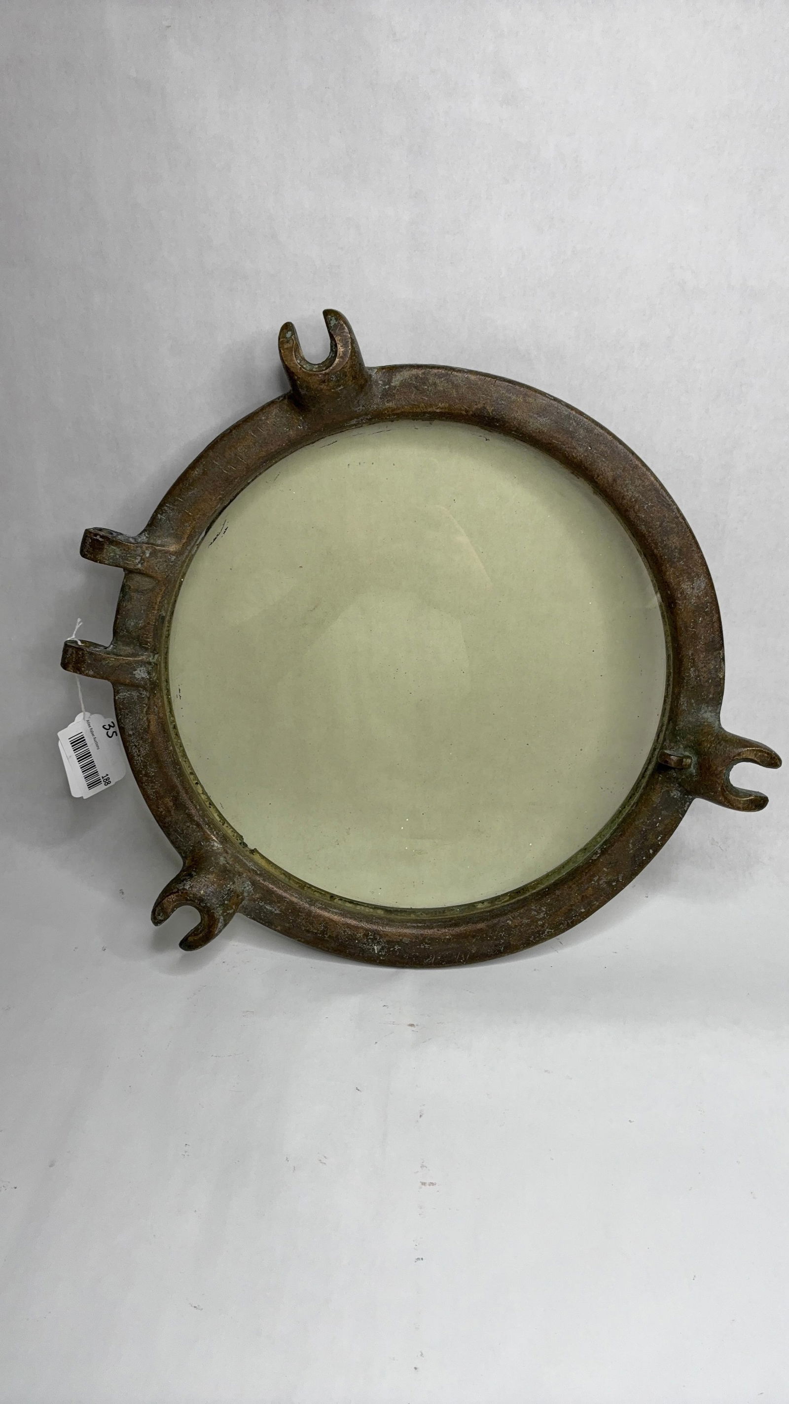 Nautical Brass Ships Porthole: 17 inch diameter, with thick glass and brass frame.