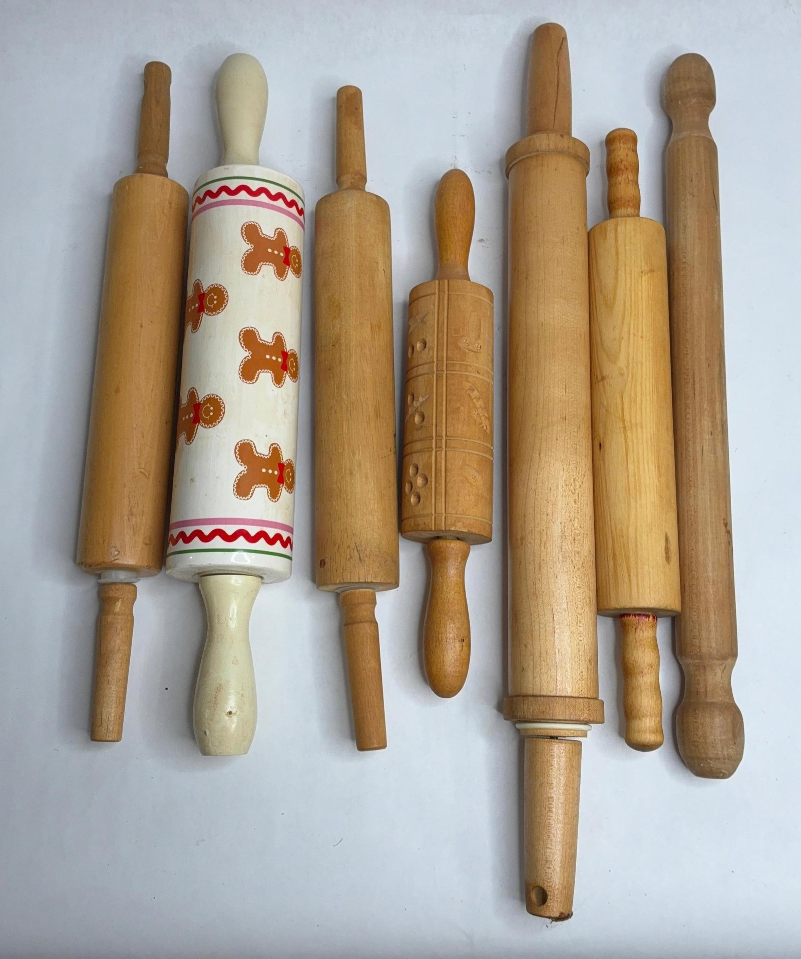 Old Wooden and Decorated Rolling Pins: Several different sizes along with a ceramic decorated pin.