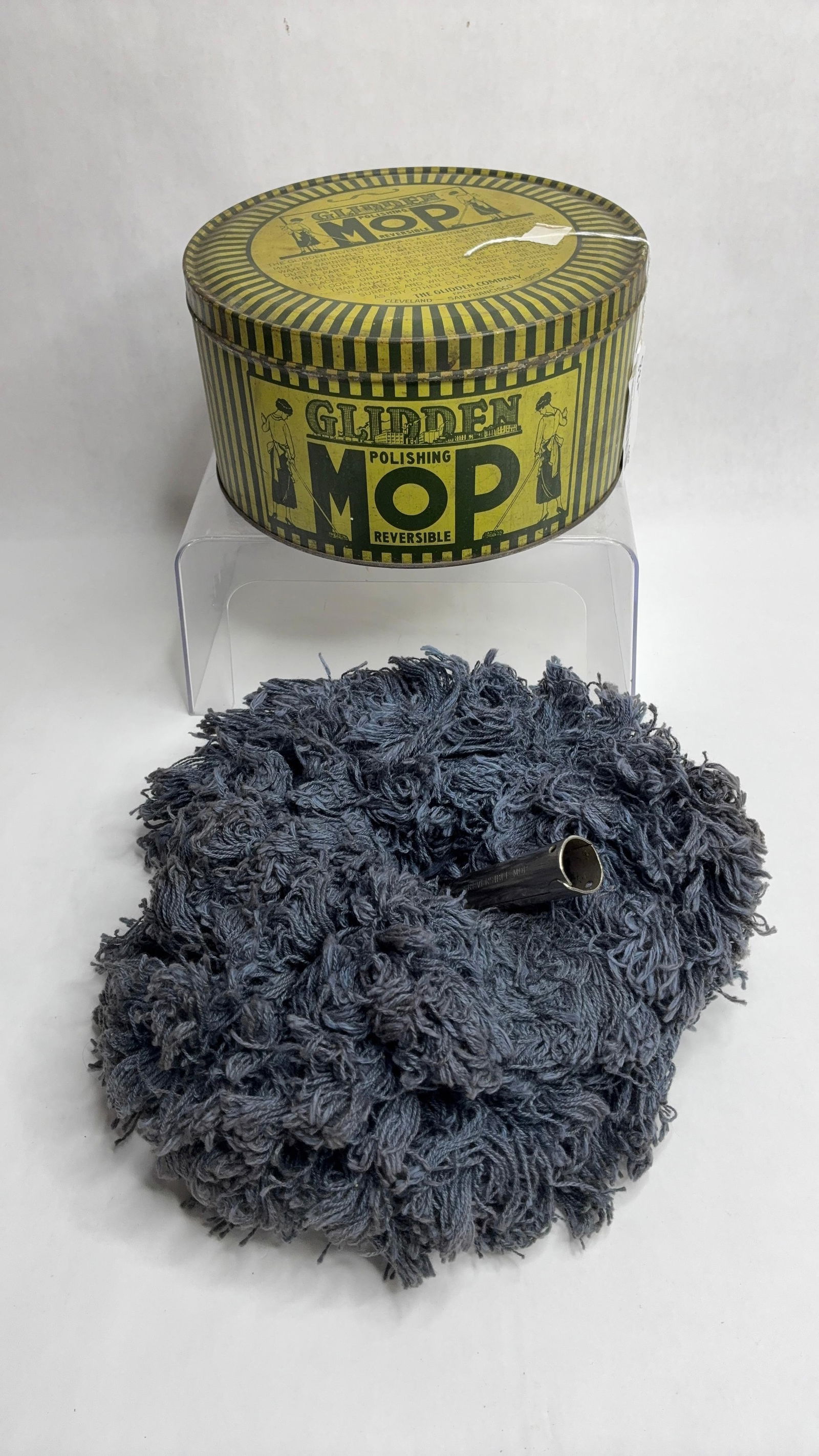 Glidden Polishing Mop Tin: The Glidden Co striped tin. 8.5x4.5. Original mop is included.
