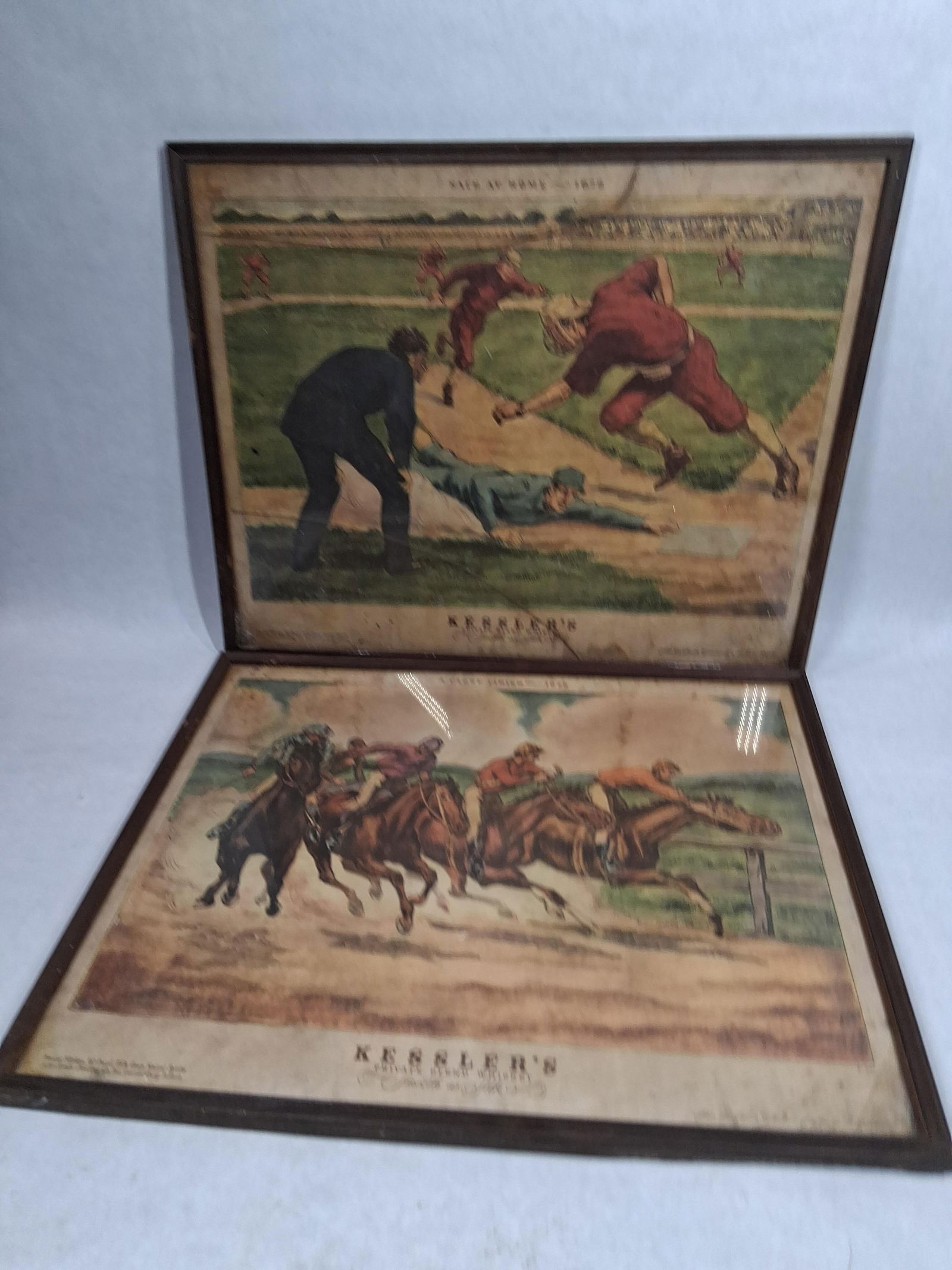 1800's Kesslers Private Blend Whiskey Safe at Home & A Close Finish Framed Lithos: These are from the private collection of Mr. Julius Kessler showing great color and graphics with water damage as well as soiling showing with cracks to glass front of frames. measuring 15.5 x 19.5