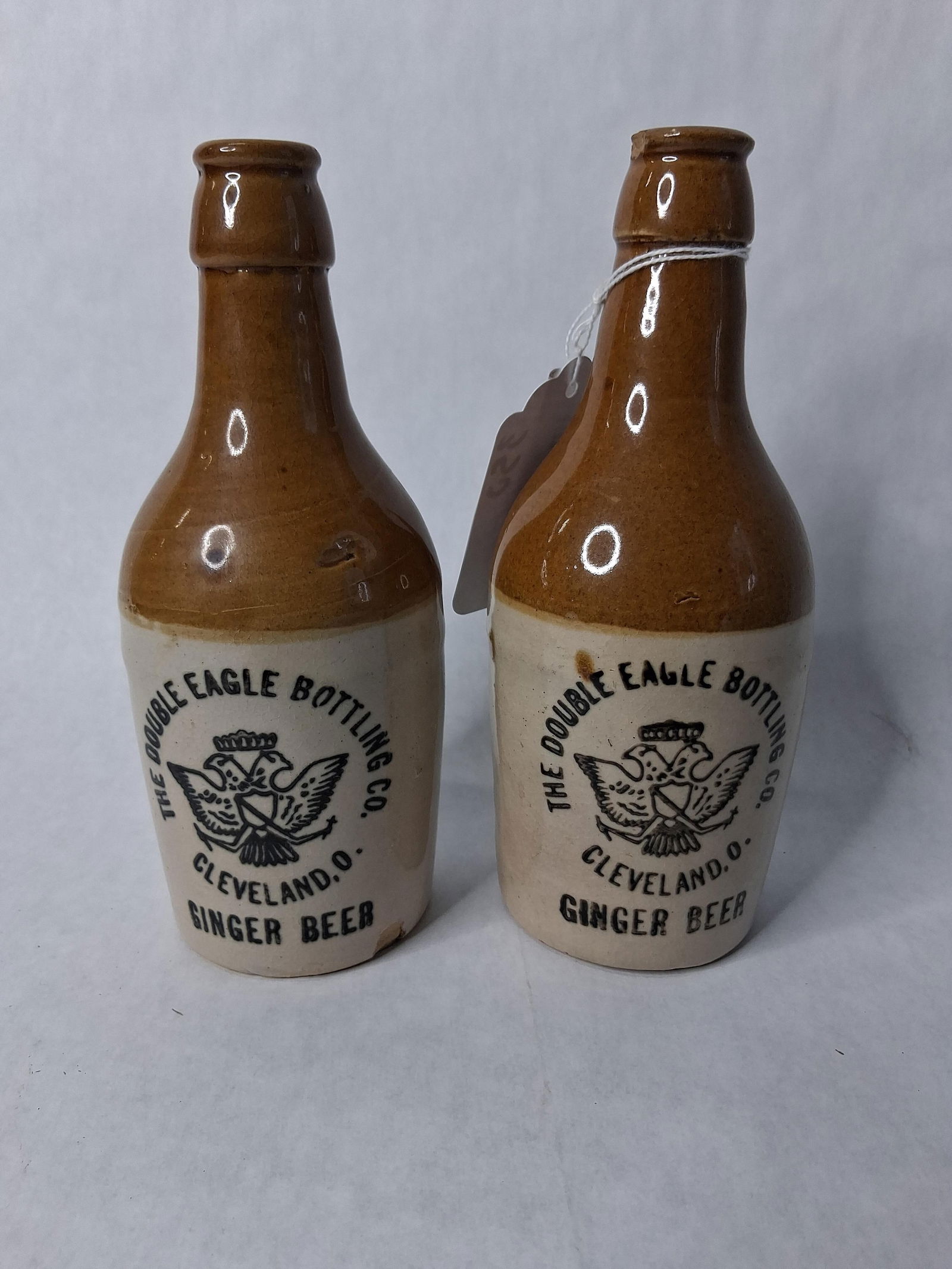 2 double Eagle bottling company Cleveland Ohio. Stoneware Ginger beer bottles (1 of 11)