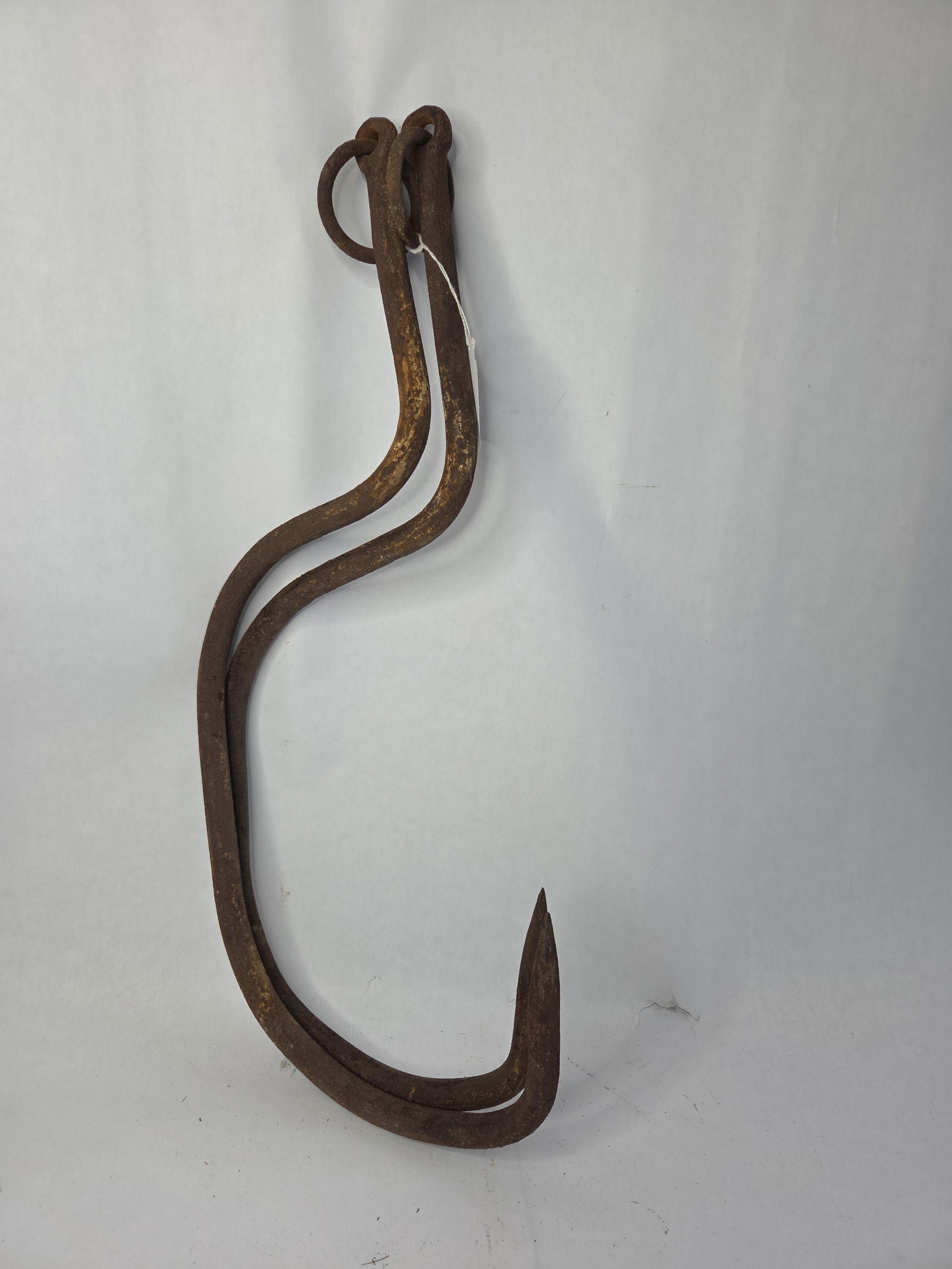 2 large primitive cast iron meat hooks: Show some rust and pitting 26 in long