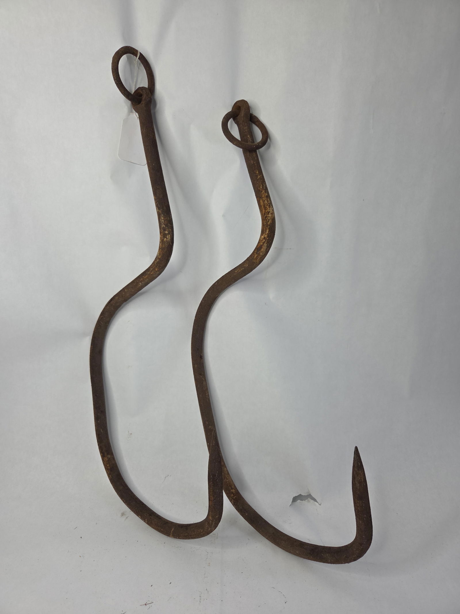 2 large primitive cast iron meat hooks - 2