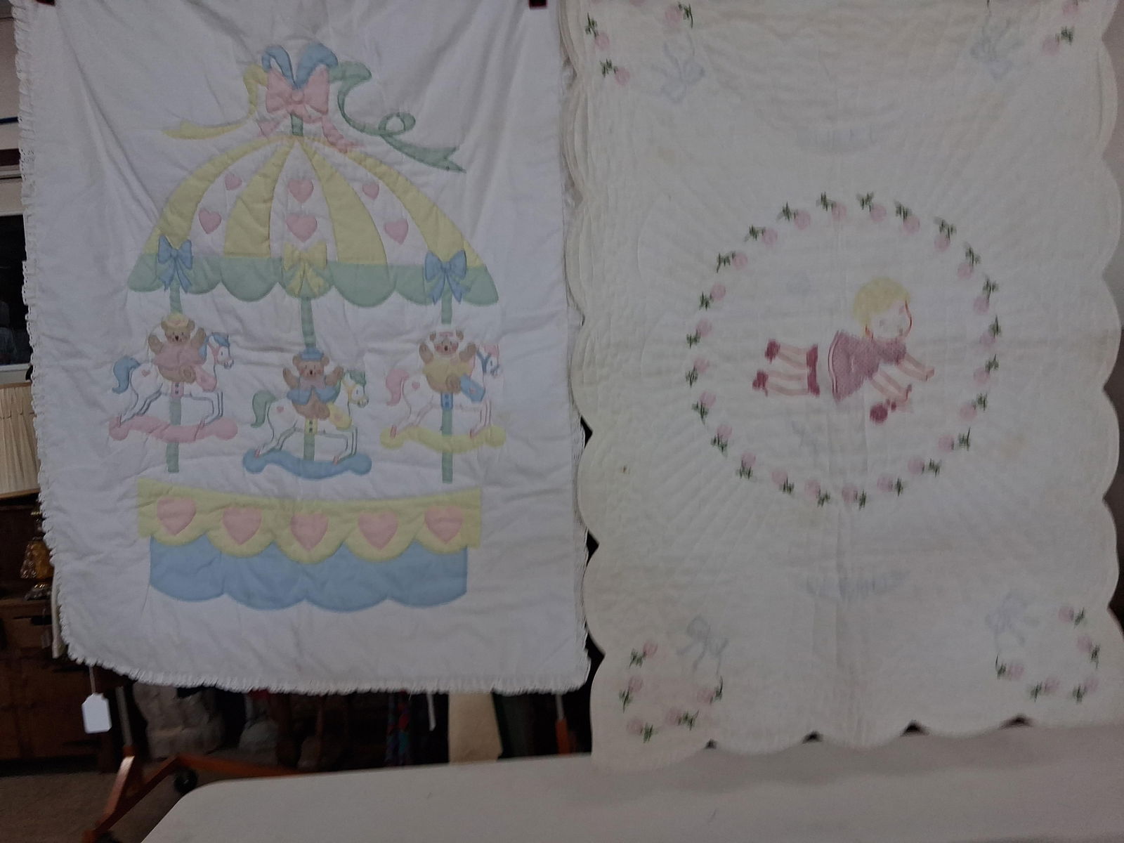 2 hand stitched embroidered crib quilts: 36x48 and 36x52