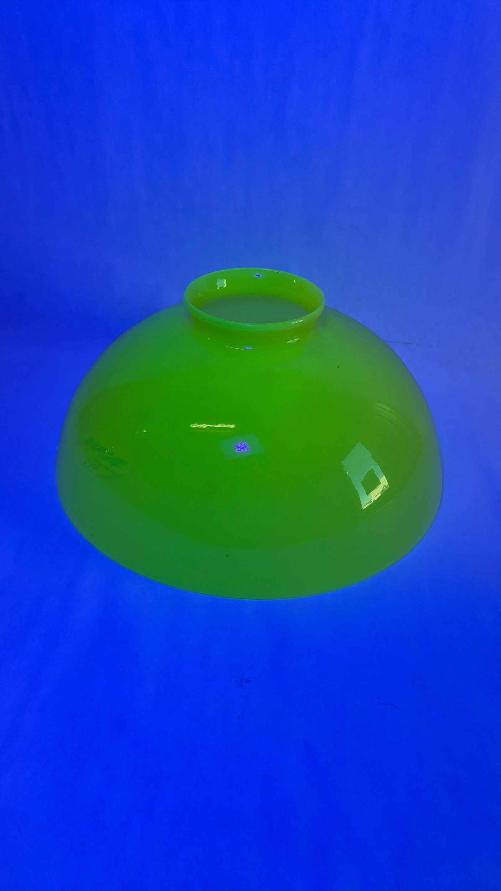 Uranium glass lamp shade: 12in dia. Glows under uv light.