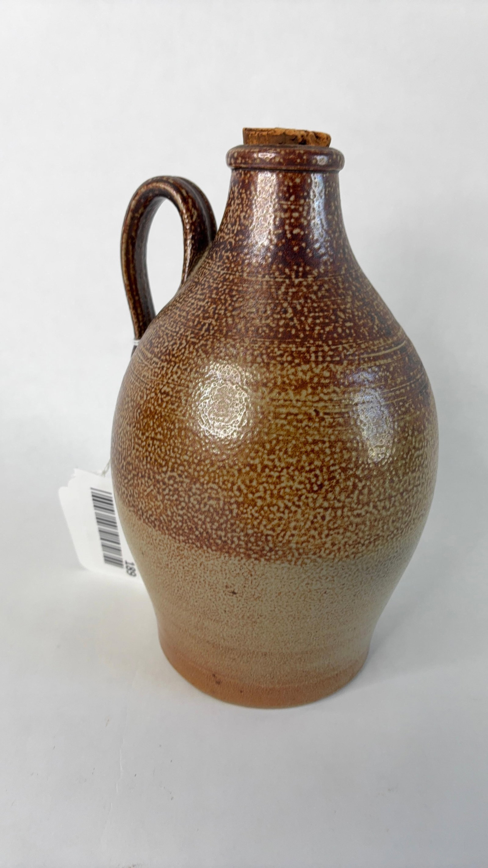 Awesome handled salt glazed crock jug: Approximately one quart size marked PBWC 83' on bottom 8in tall
