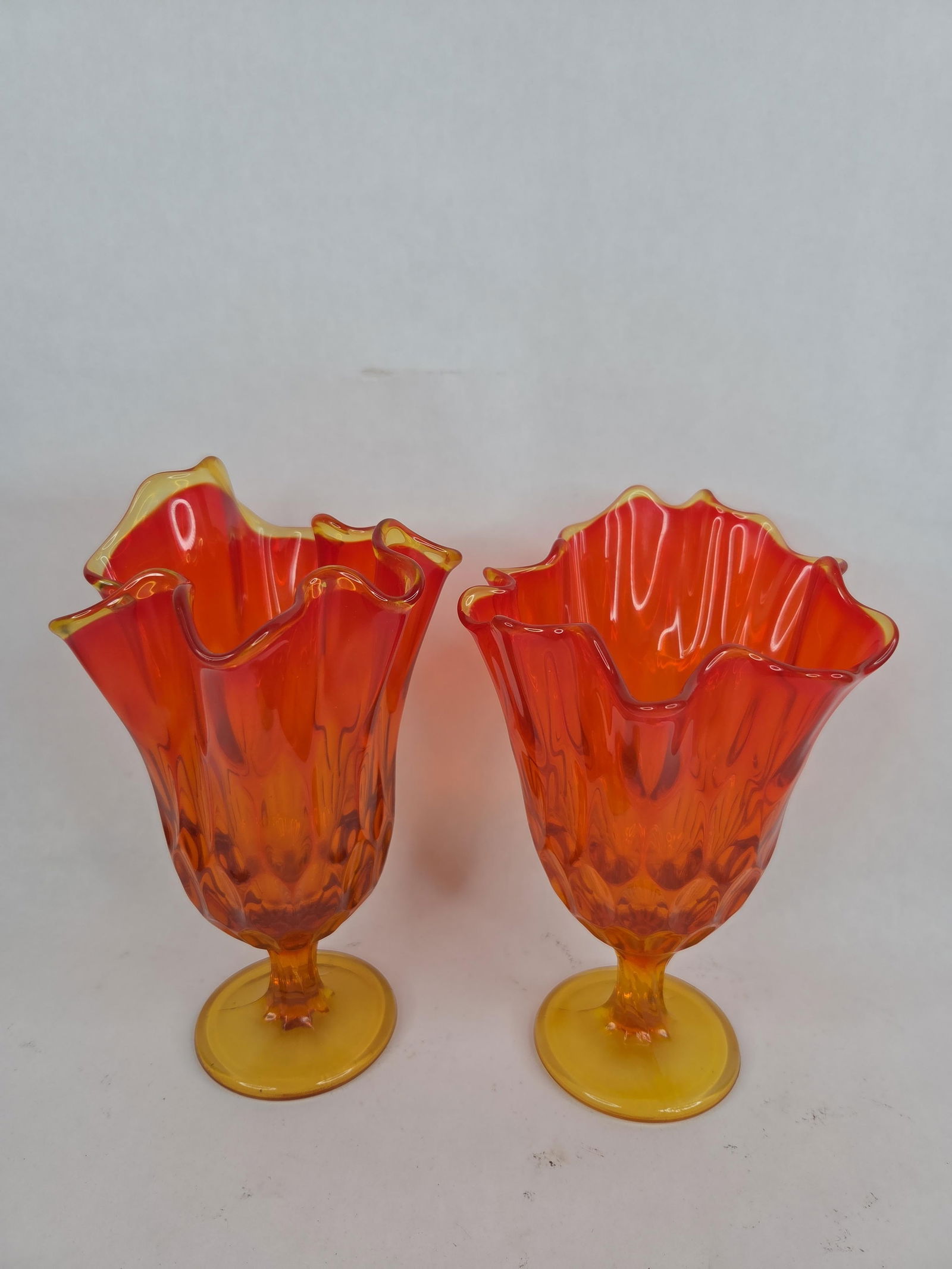 2 Fenton Amberina swung thumbprint pedestal vases: 8.5 in tall no chips or cracks