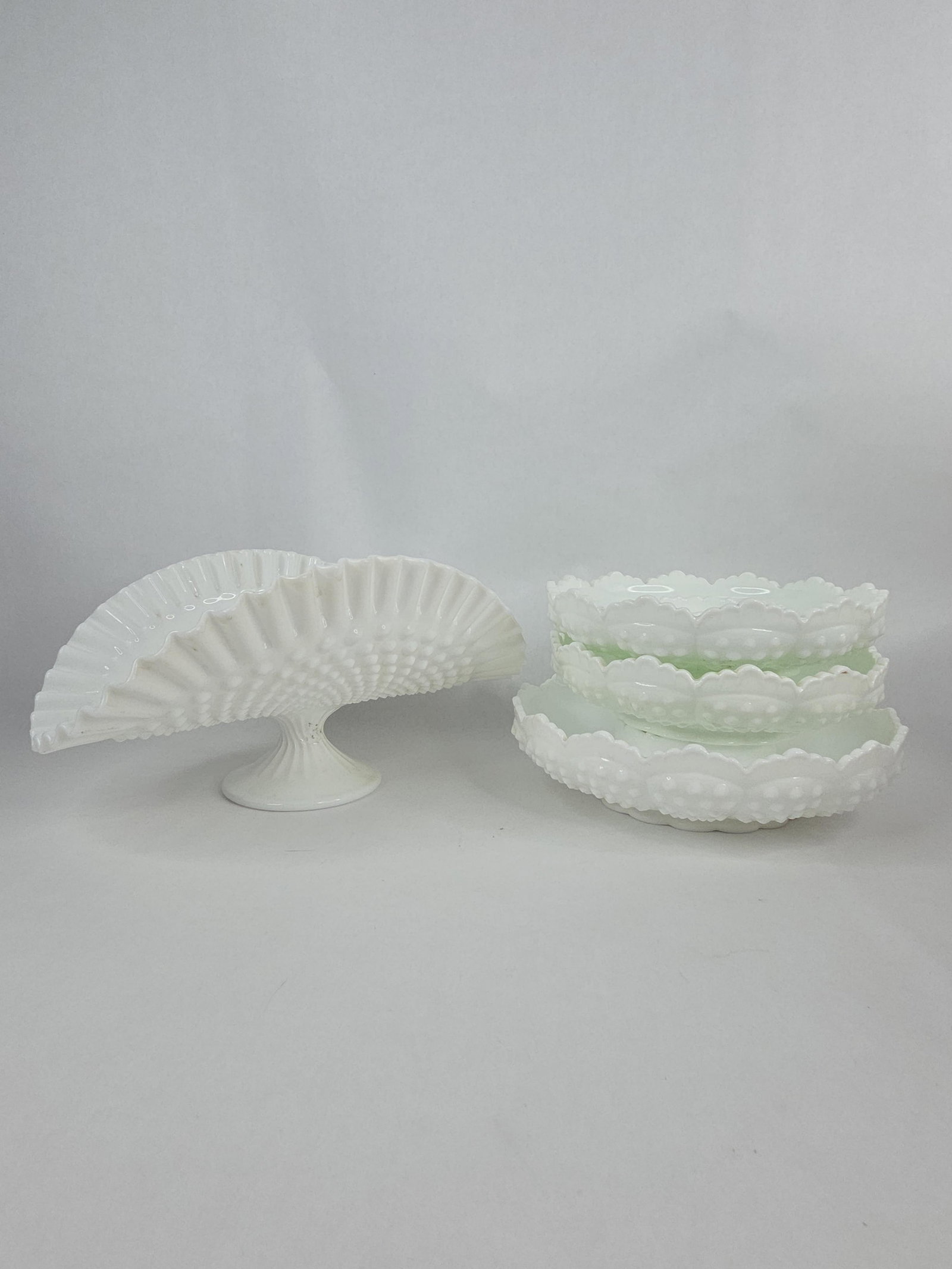 Fenton hobnail ruffled edge milk glass banana/fruit boat and 3 comparted bowls: Largest bowl has a 9.5 in diameter. 2 smaller ones 8in diameter. No chips or cracks found