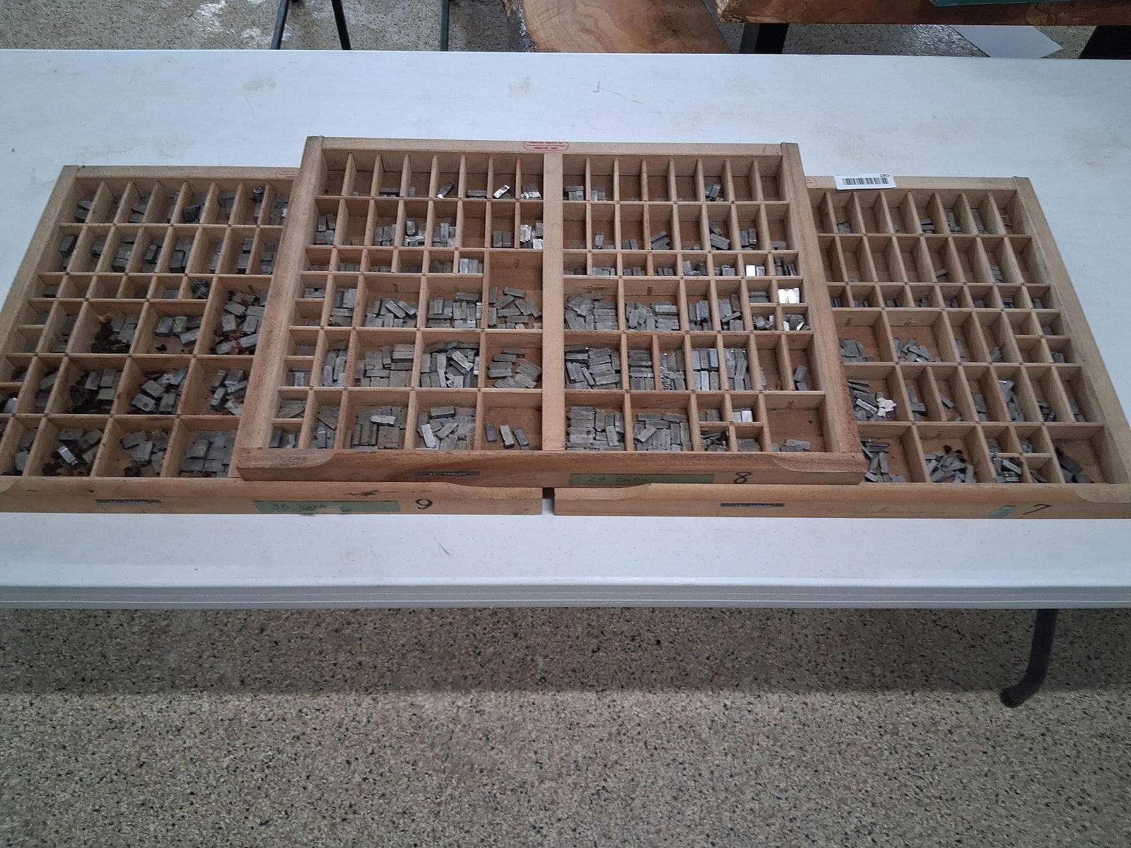 3 printer trays loaded with letters and number (1 of 9)