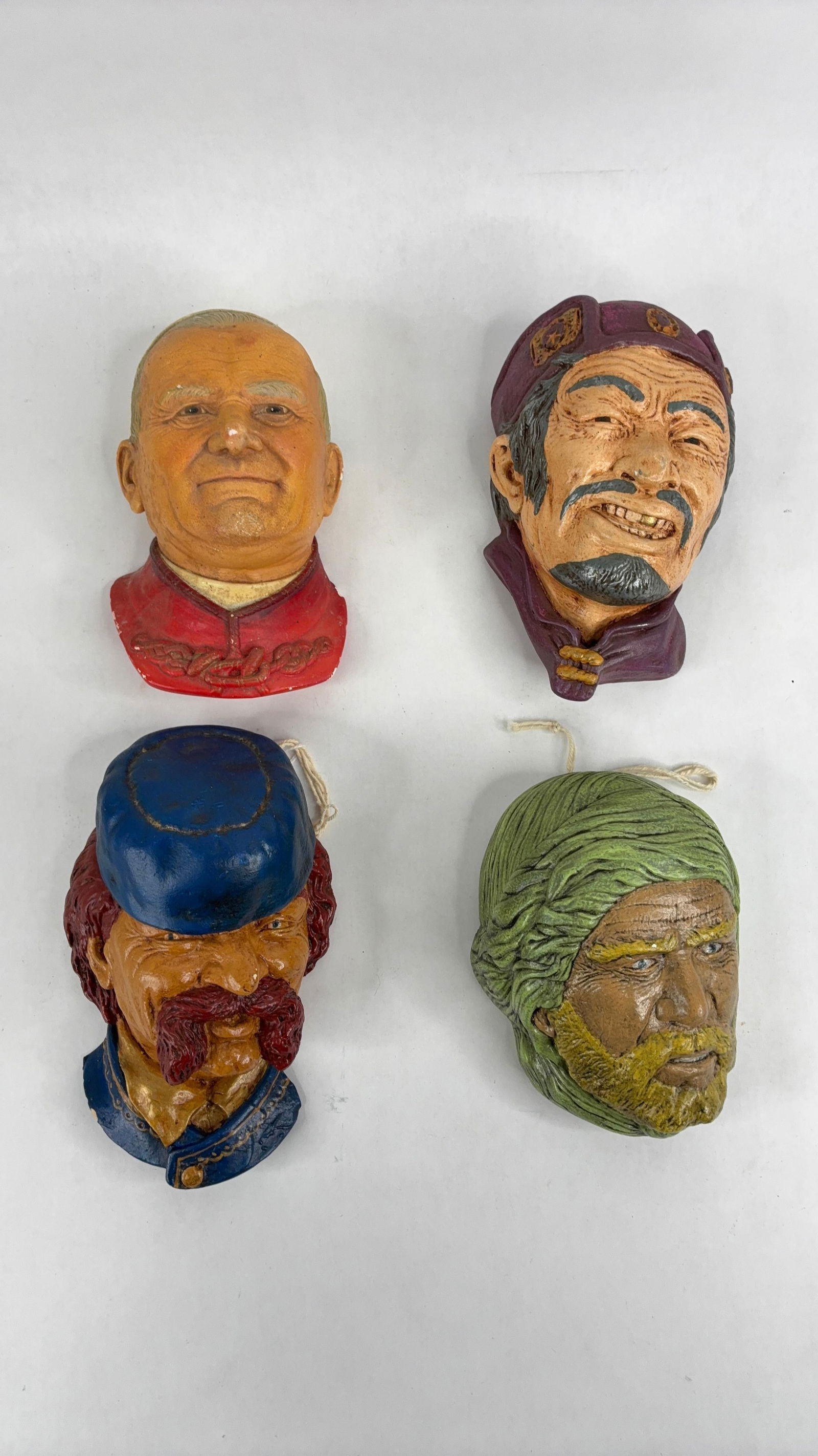 4 caulk ware heads: includes soldier,pope,Asian and Turkan caulk ware heads 6 in long