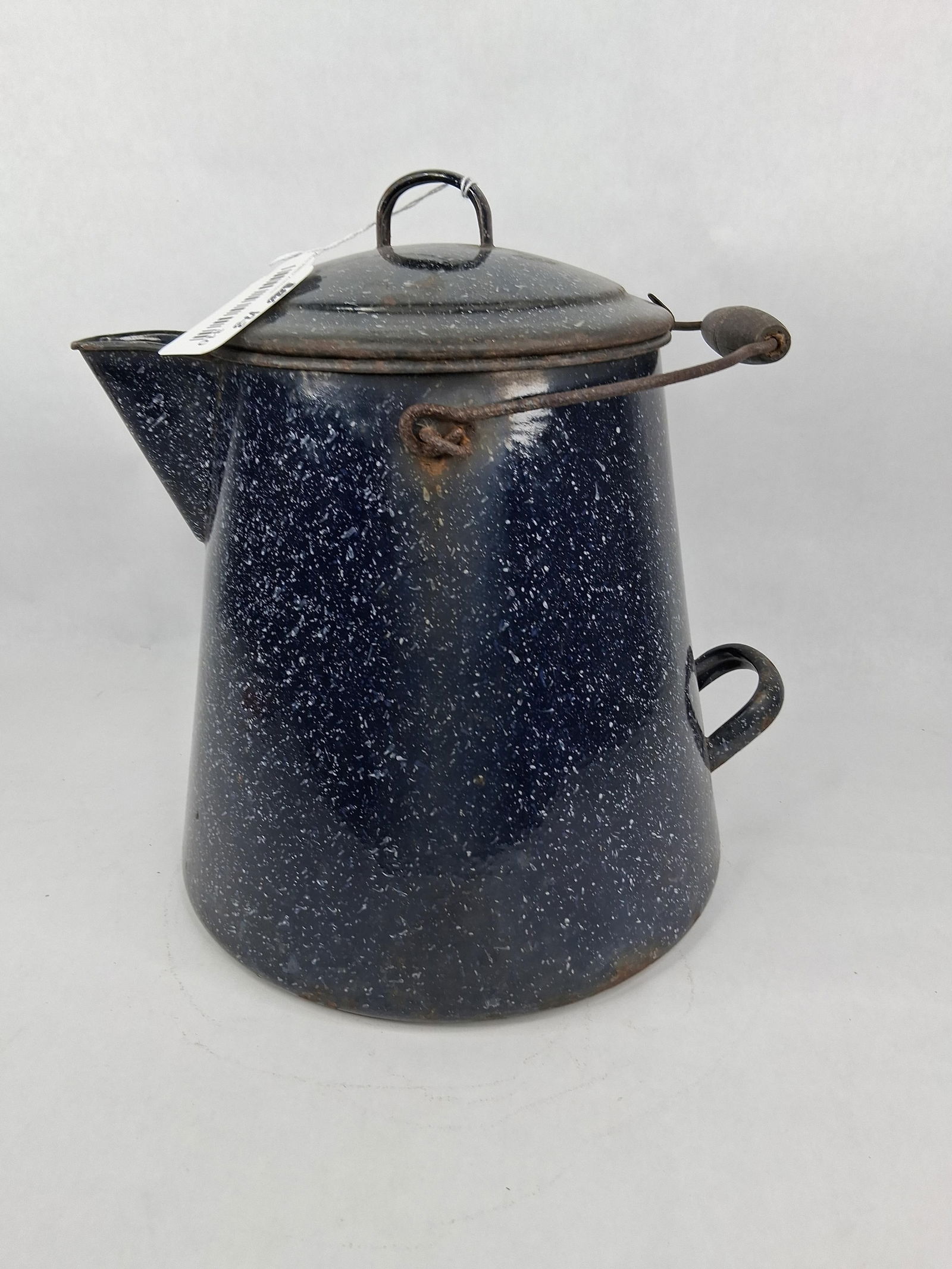 Large granite campfire coffee pot: has a few pin holes in bottom but displays nicely
