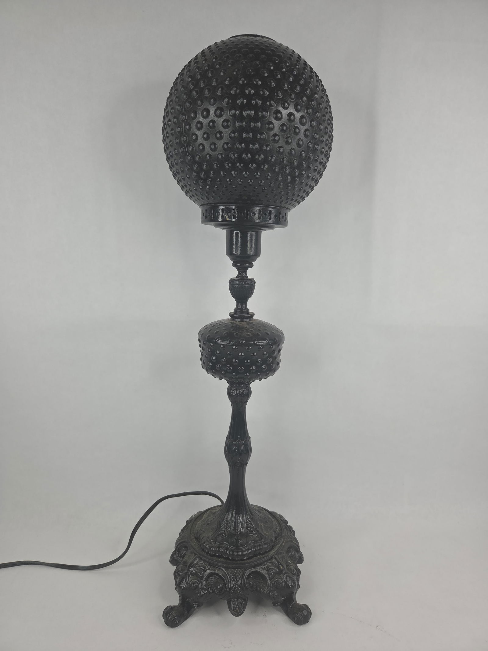 Black painted cast iron and hobnail glass table lamp: 28 in tall. in good working condition