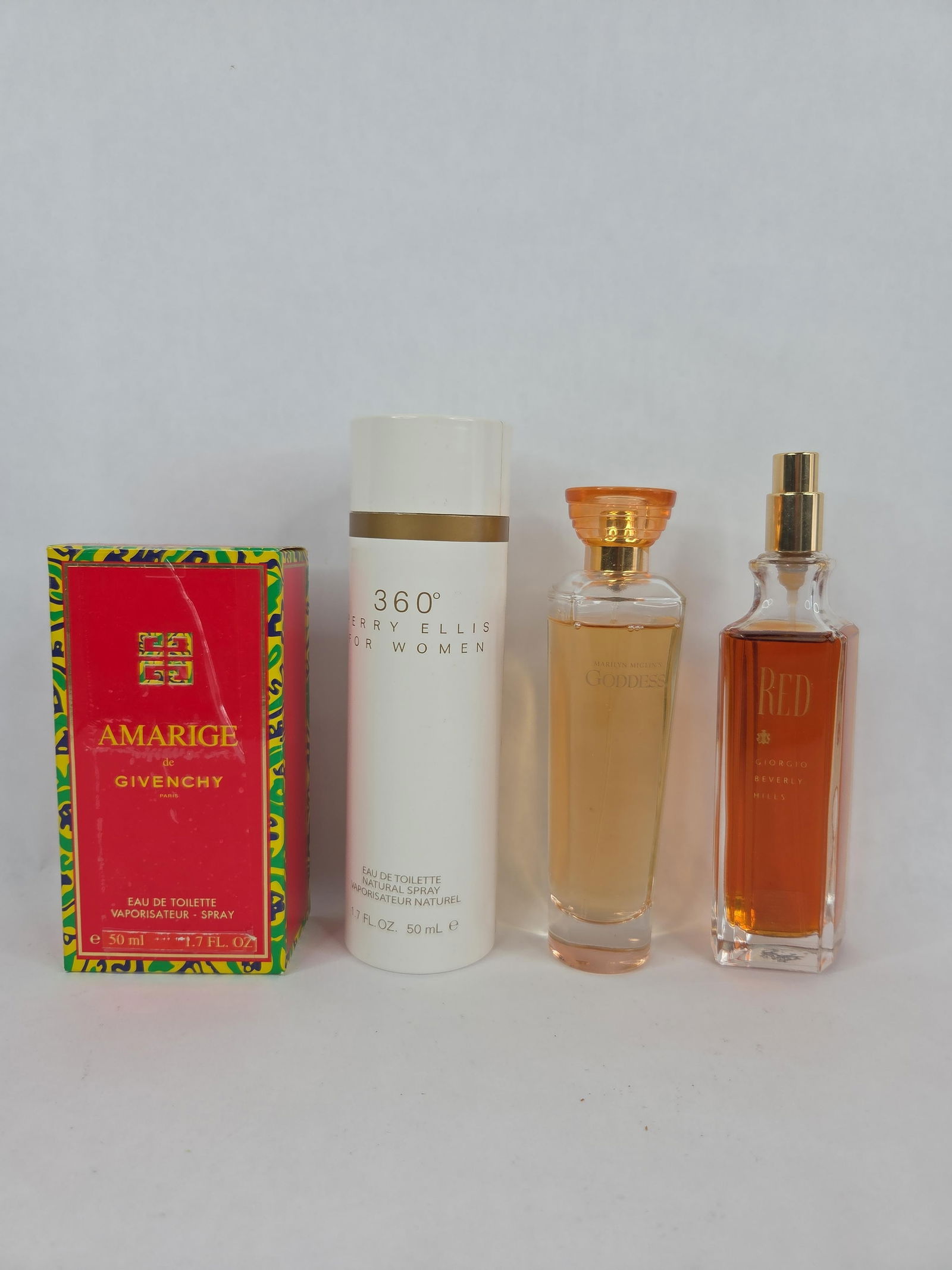 Vtg Red,Goddess,360 and Amarige perfumes: .