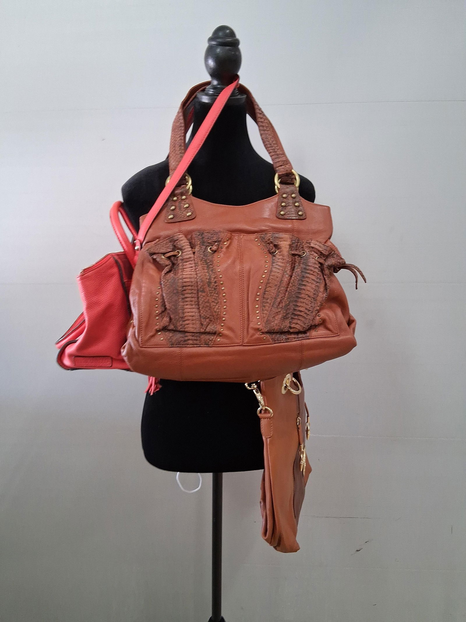 Vtg Red and brown leather handbag/ purses by Tignanello,Iman,and CHI: all are in like new condition