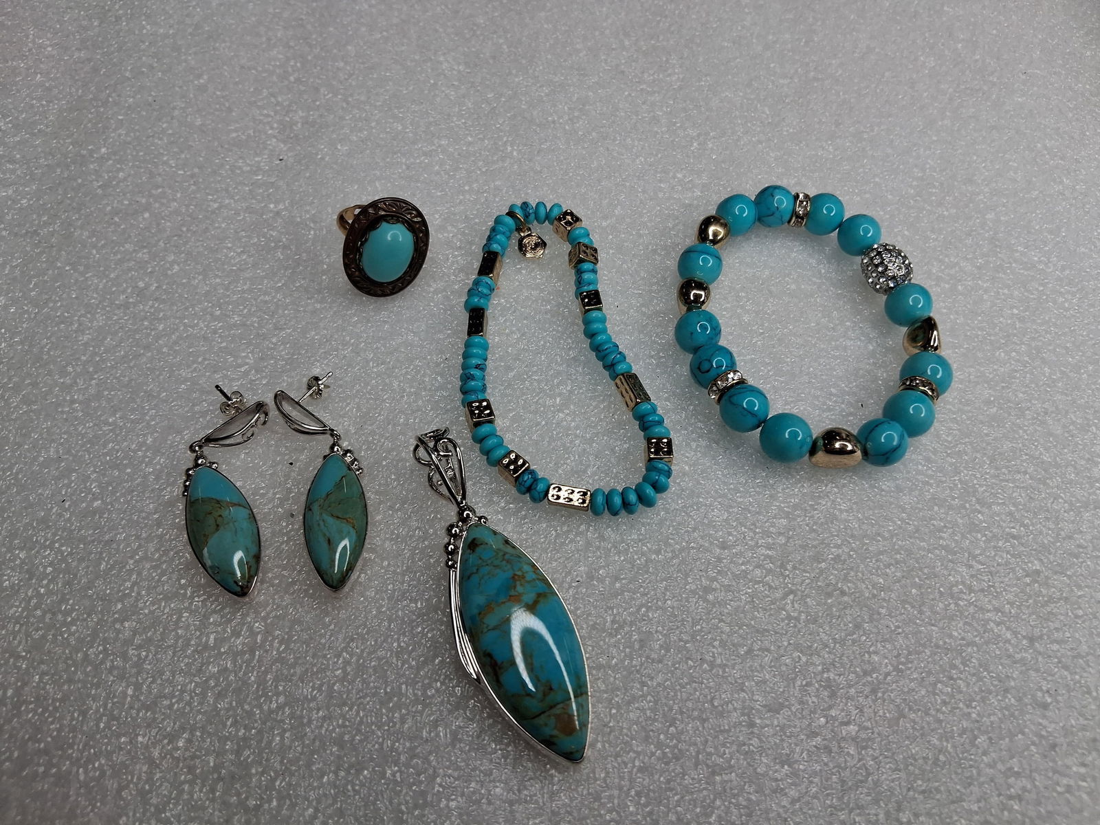 Turquoise ring, Pendant ,earrings, and bracelets (1 of 6)