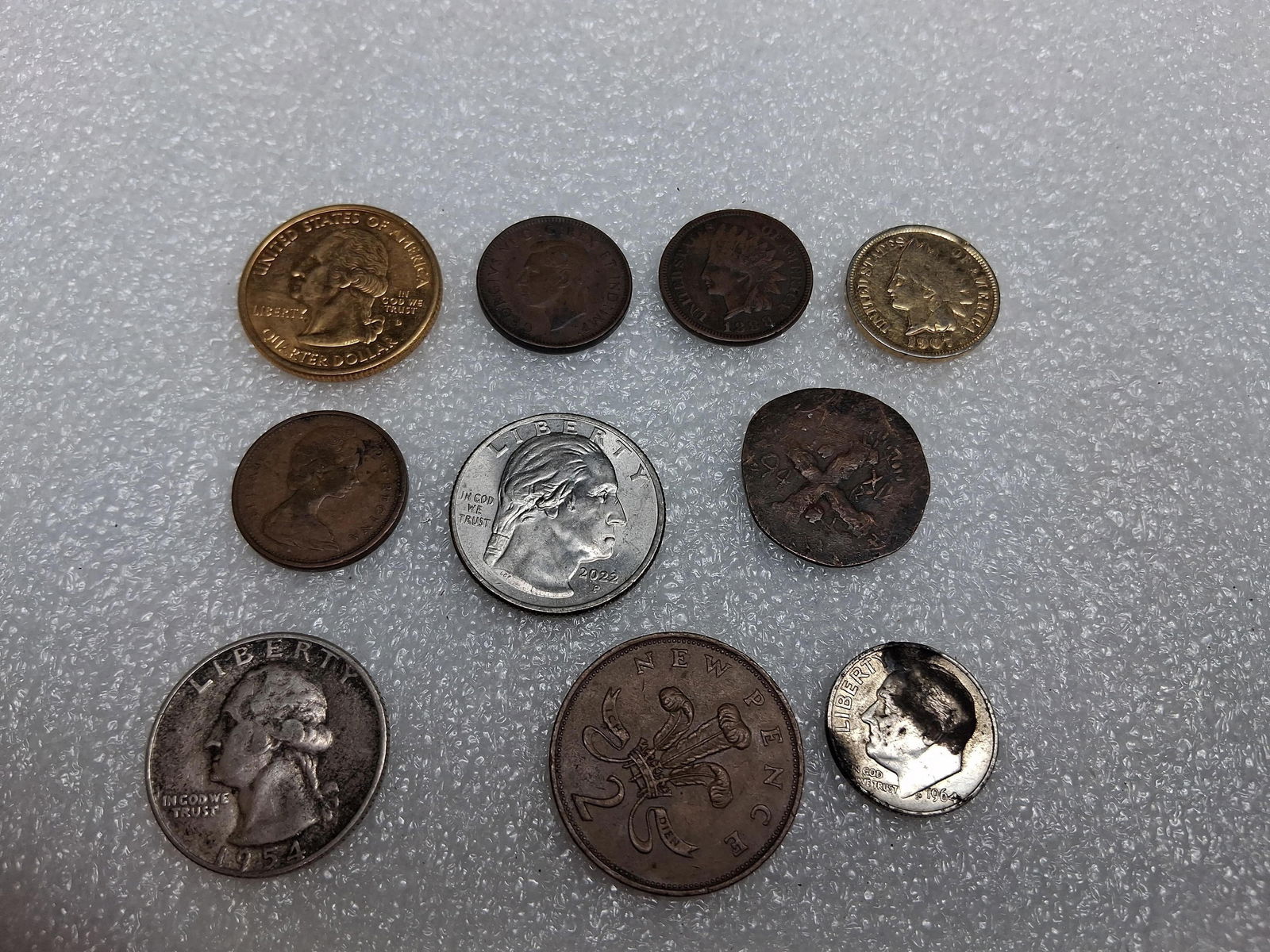 Silver quarter, dime and other misc. coins: includes Indian head penny and more