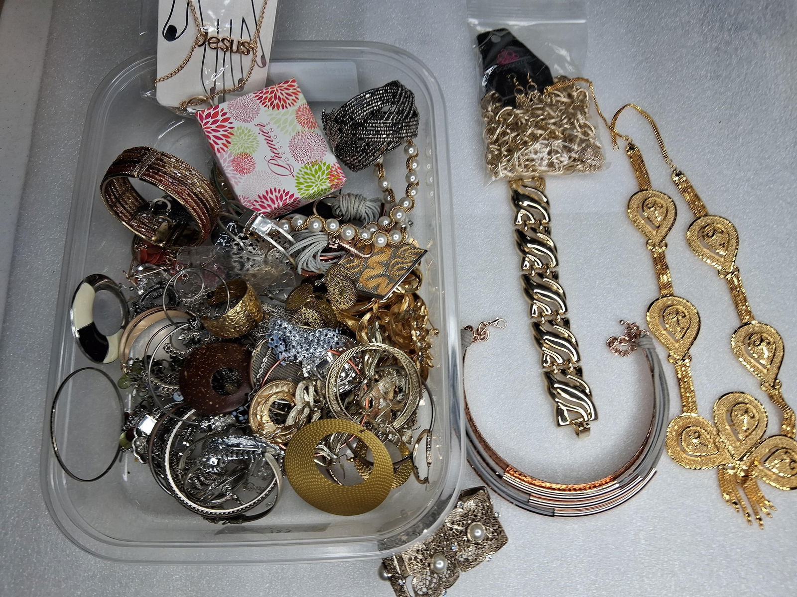 Gold and silver toned costume jewelry: Necklaces, bracelet ear rings and more